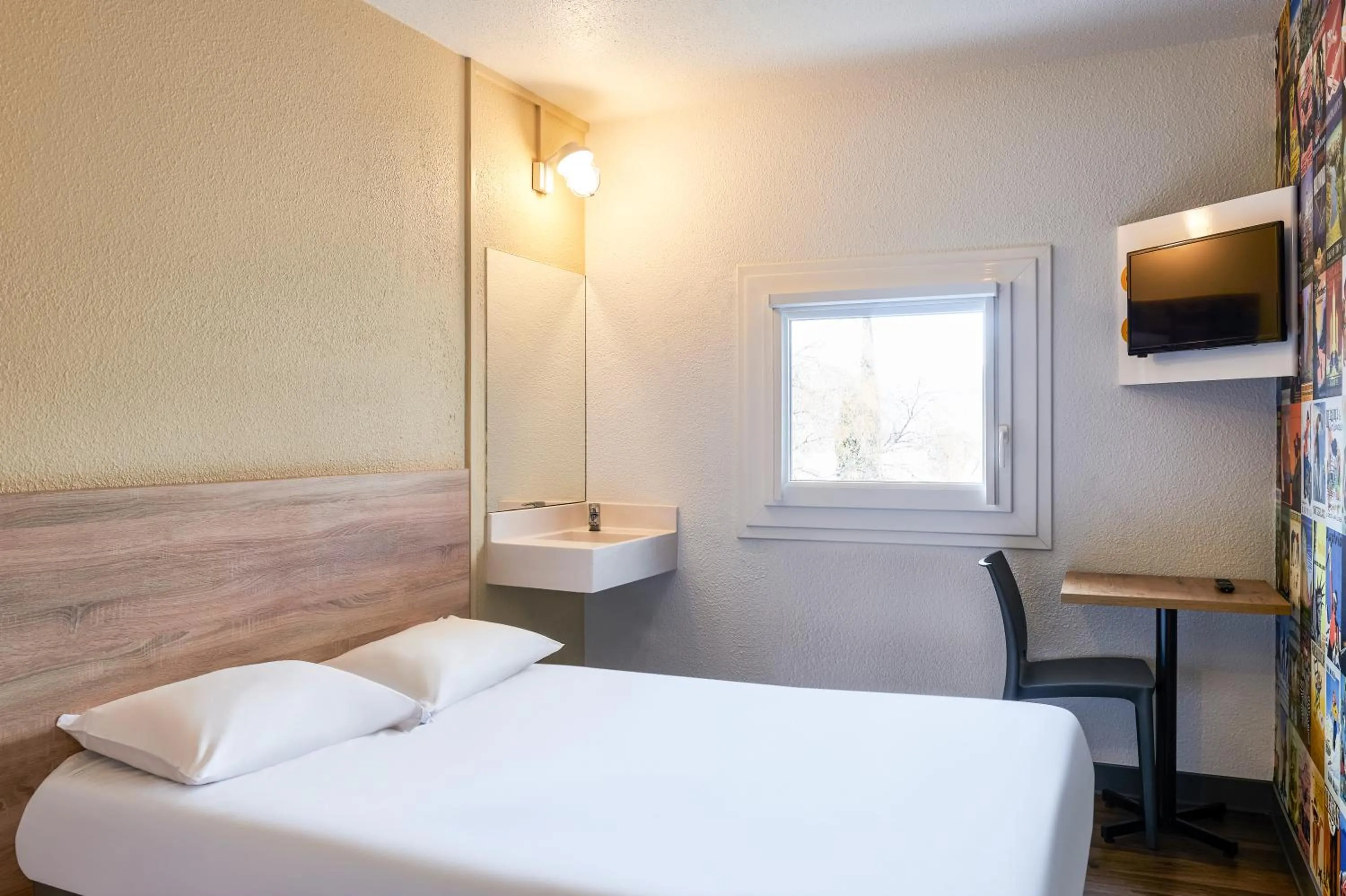 Bed in hotelF1 Paris Saint Denis Stade