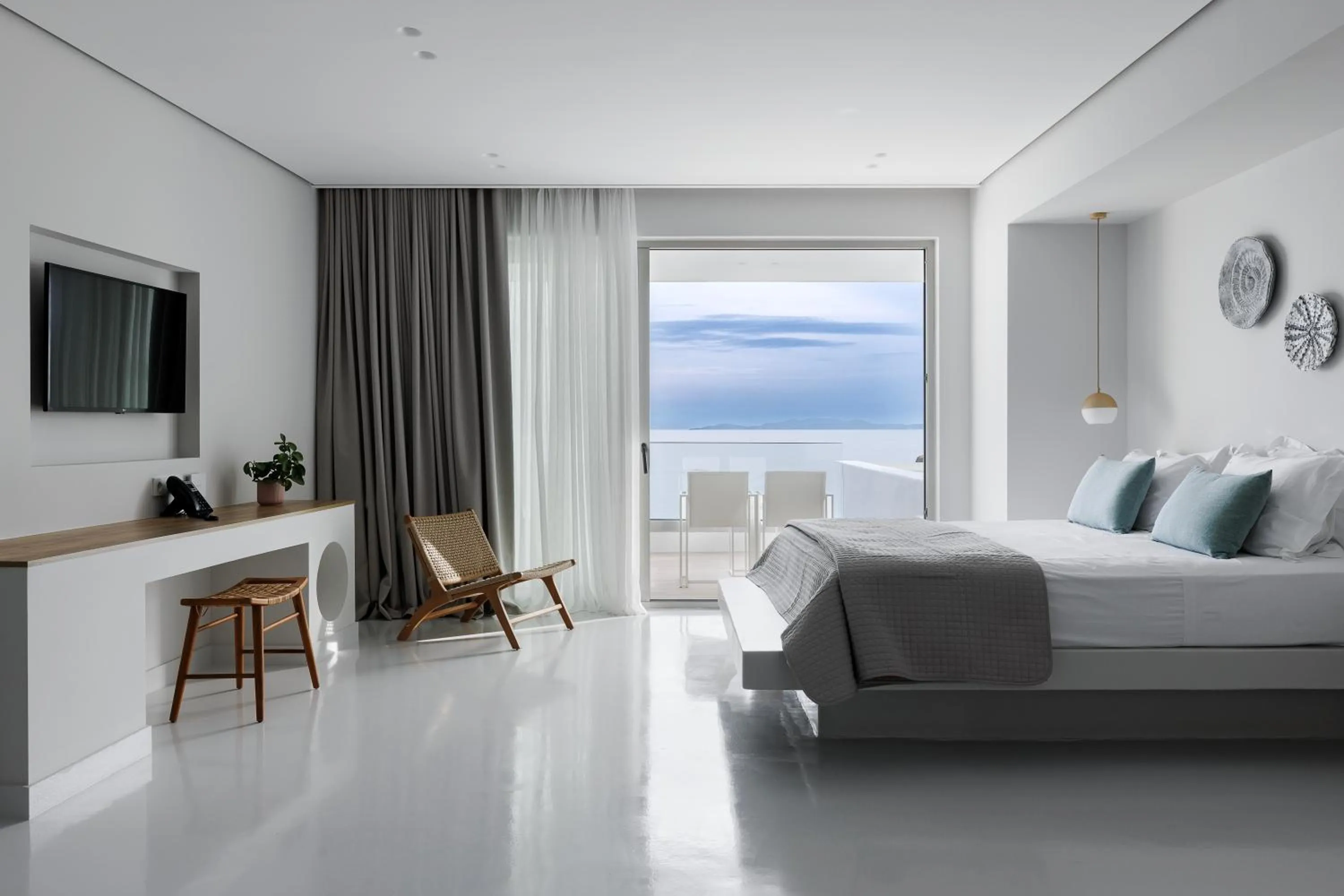 Bed in Infinity View Hotel Tinos