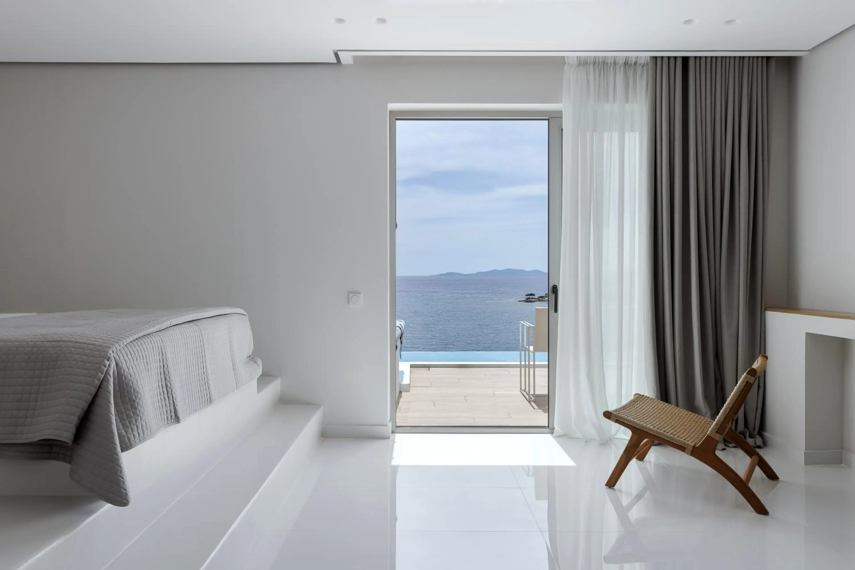 Bed in Infinity View Hotel Tinos