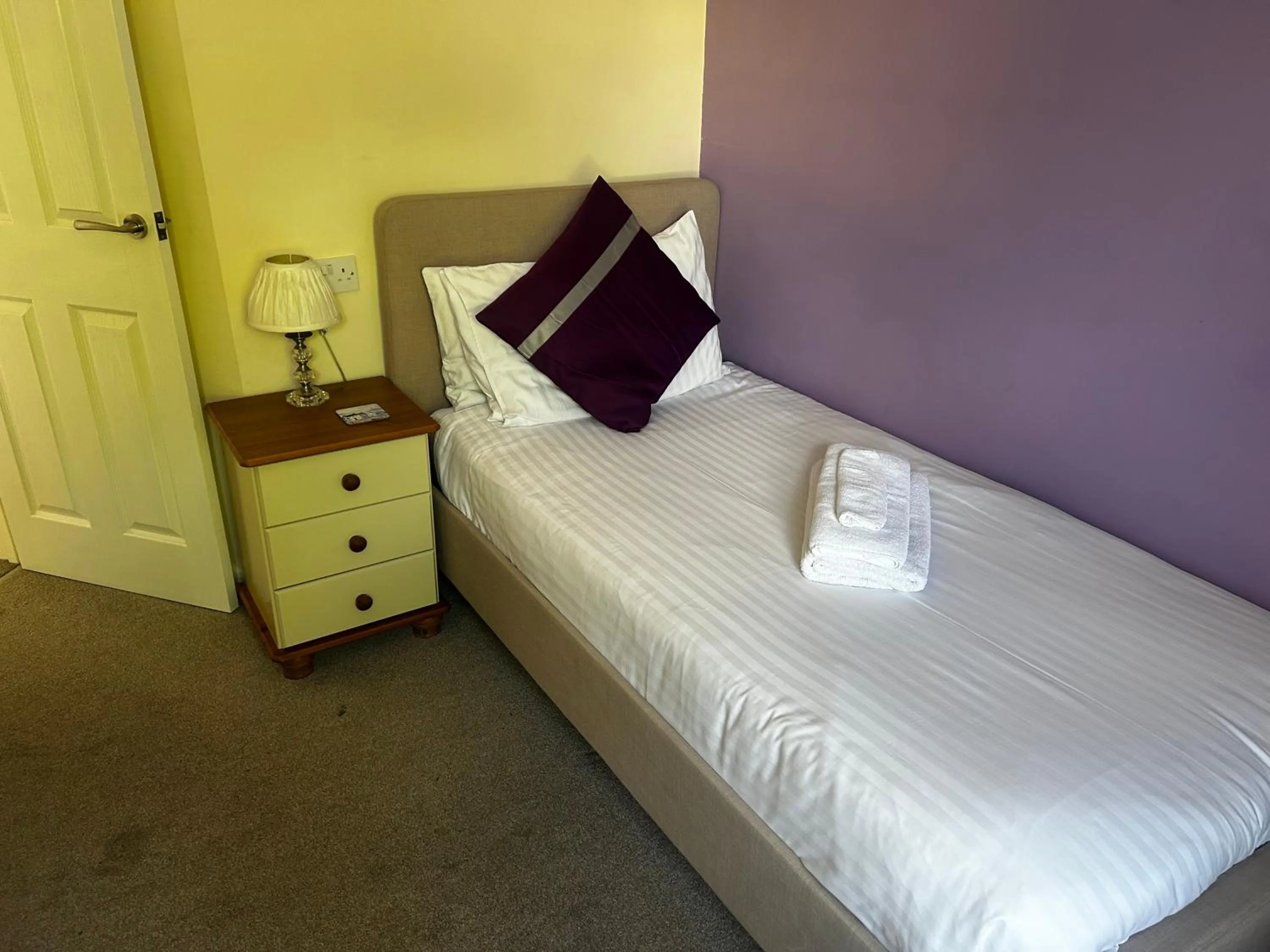 Bed in amber house hotel