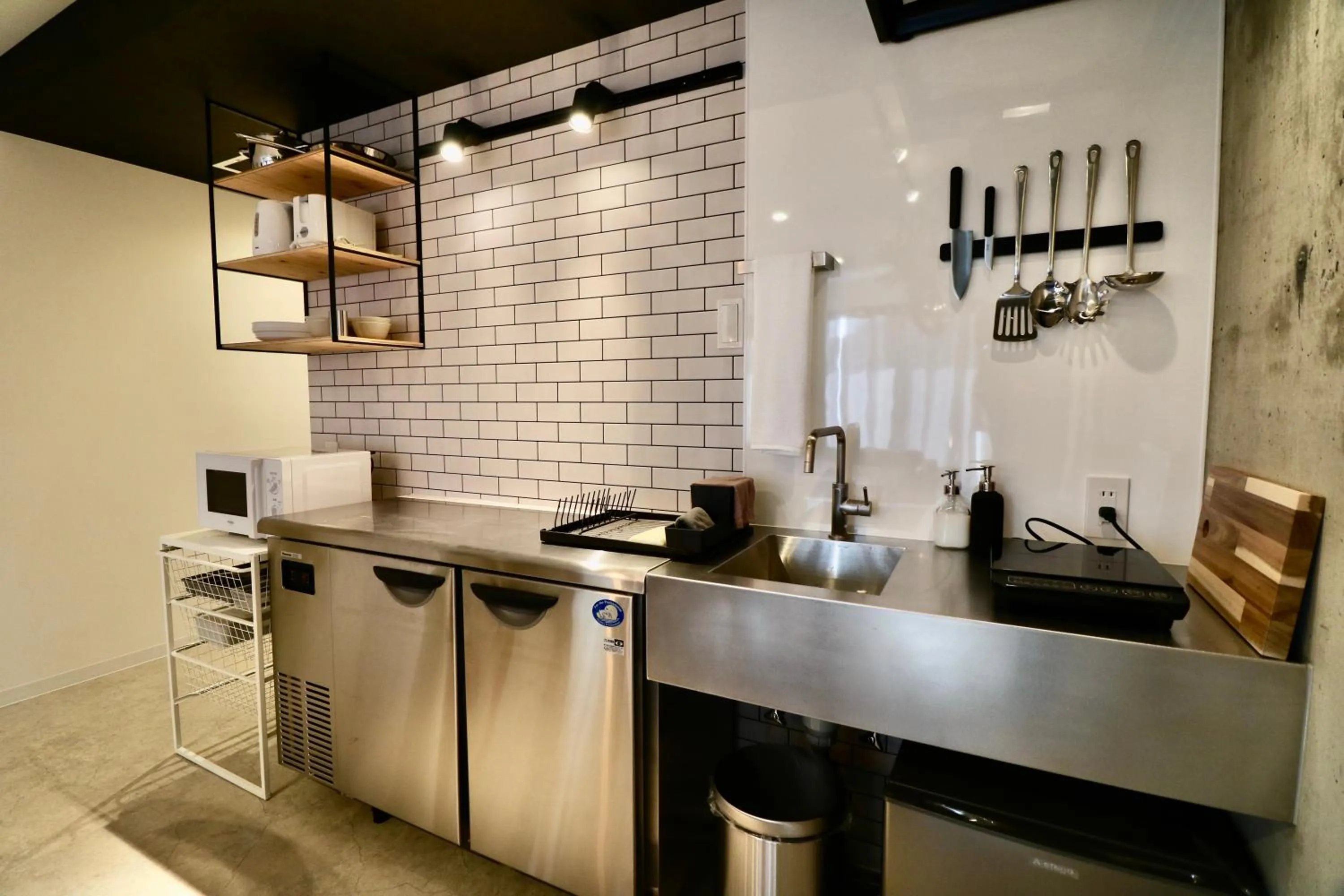 Kitchen or kitchenette in TAKETO STAY Kotoni