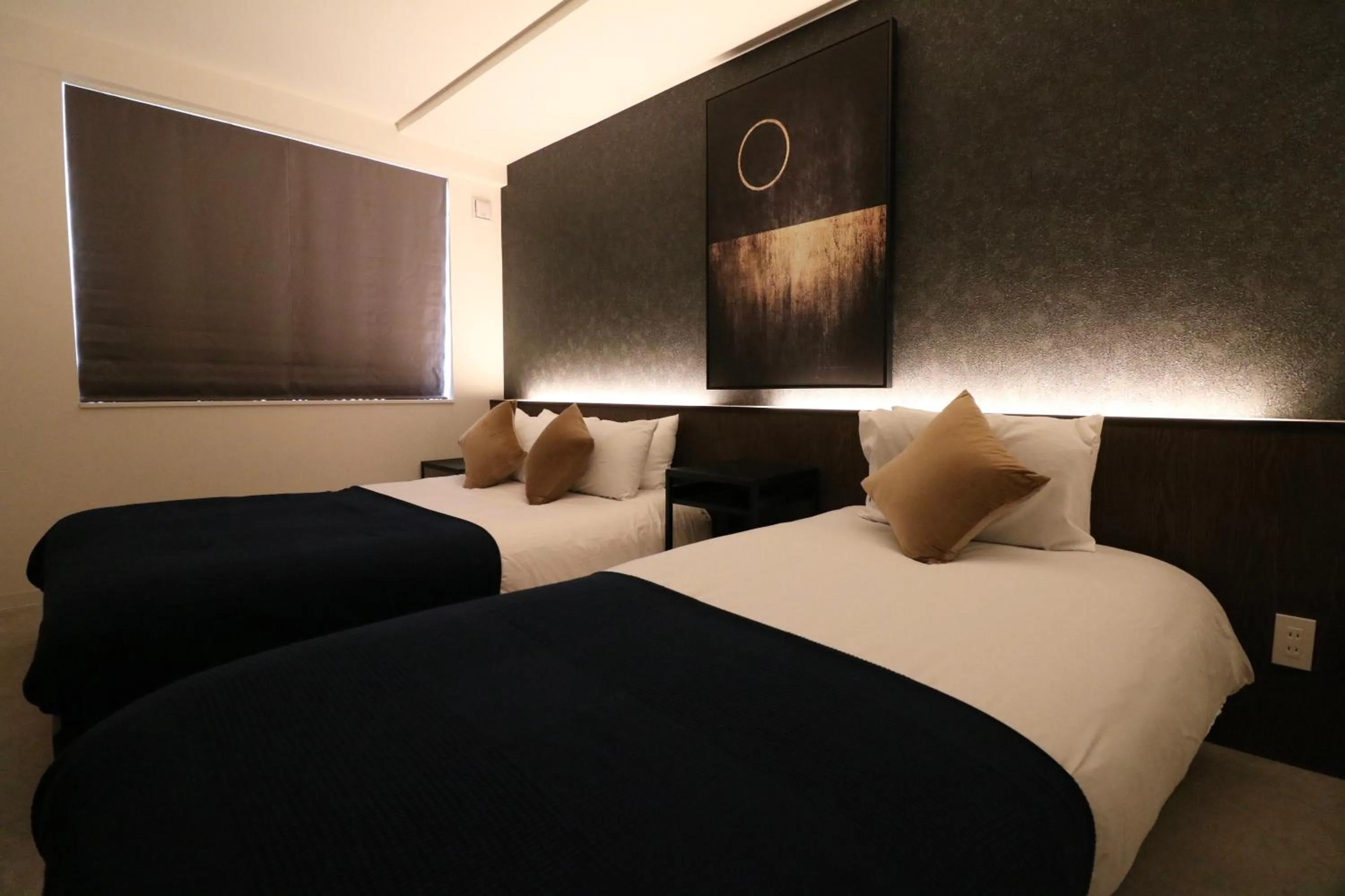 Bed in TAKETO STAY Kotoni