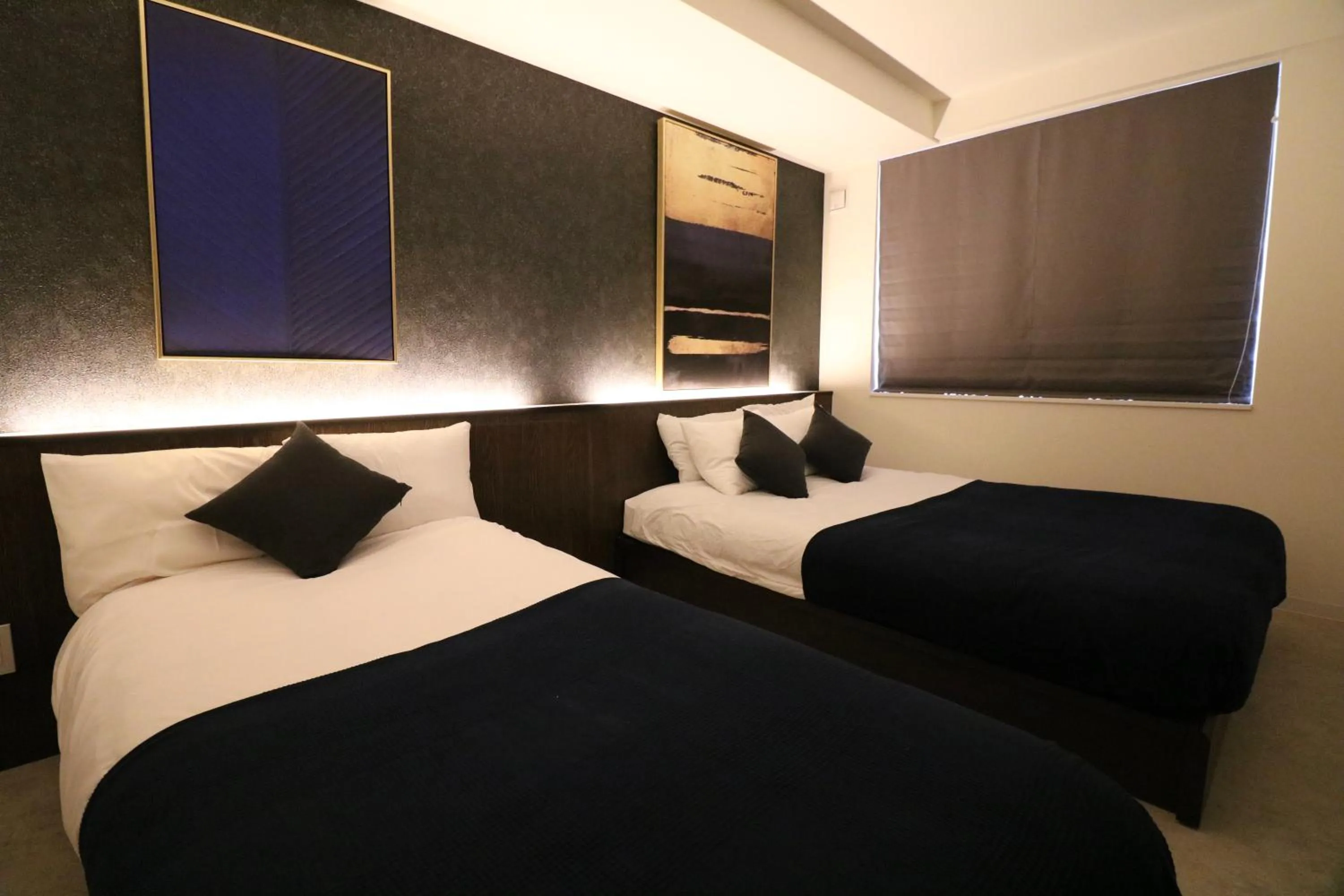 Bed in TAKETO STAY Kotoni