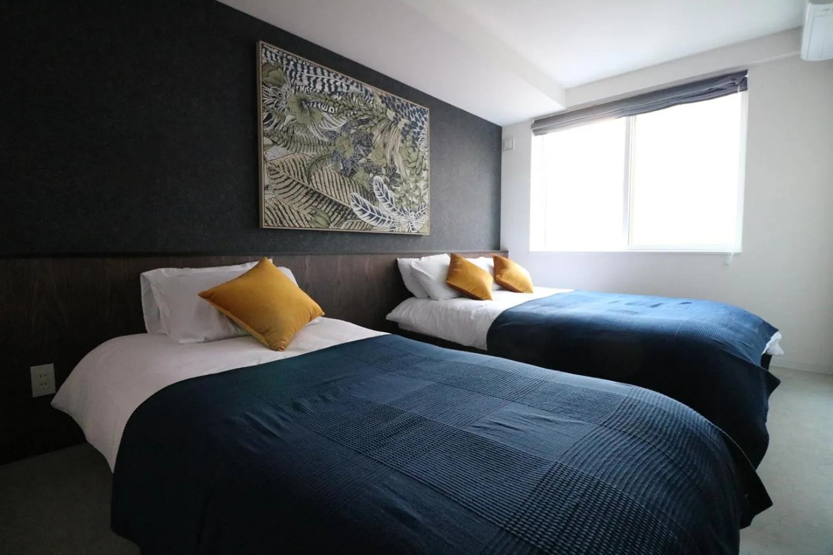 Bed in TAKETO STAY Kotoni