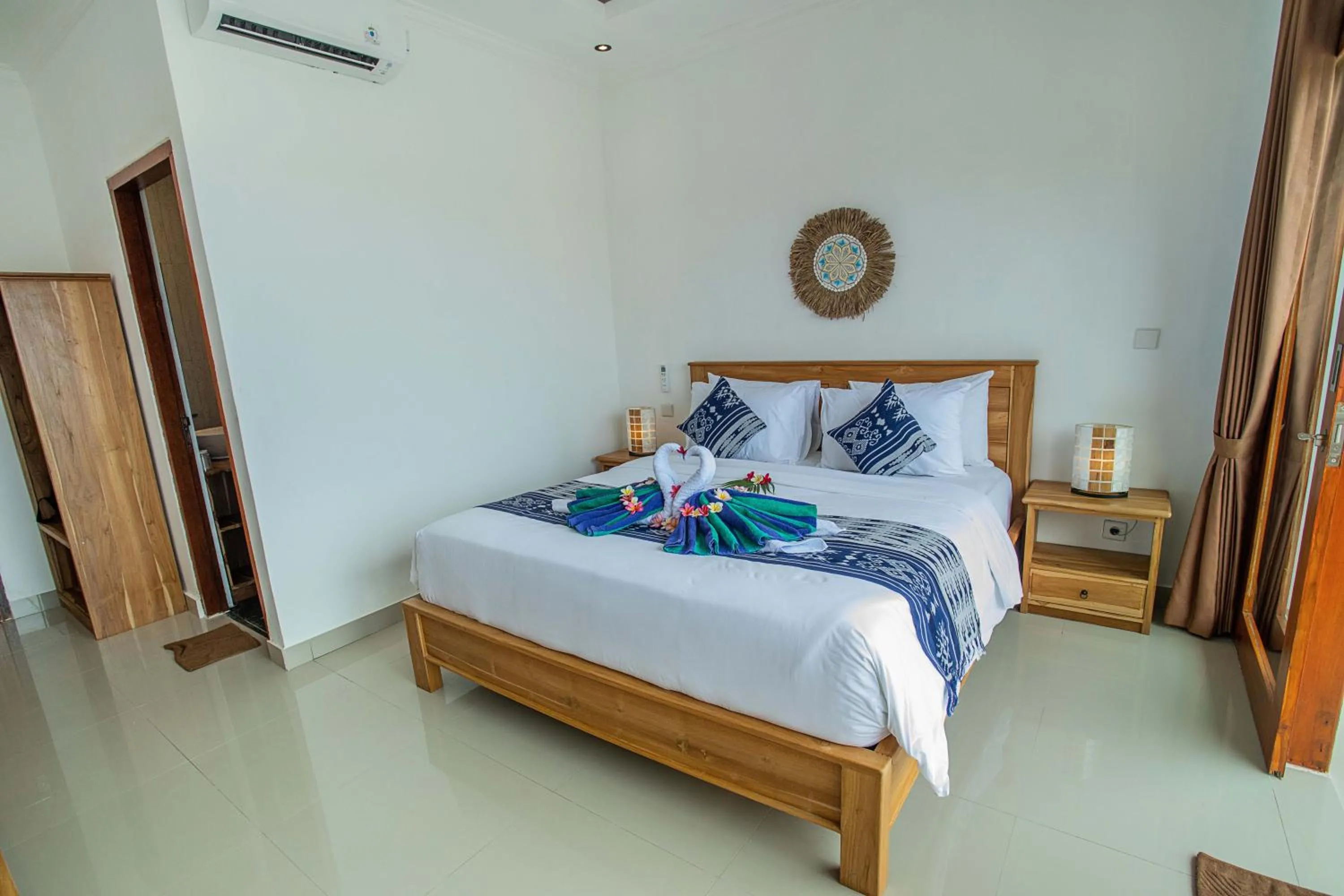 Bed in The Pulau Bungalow