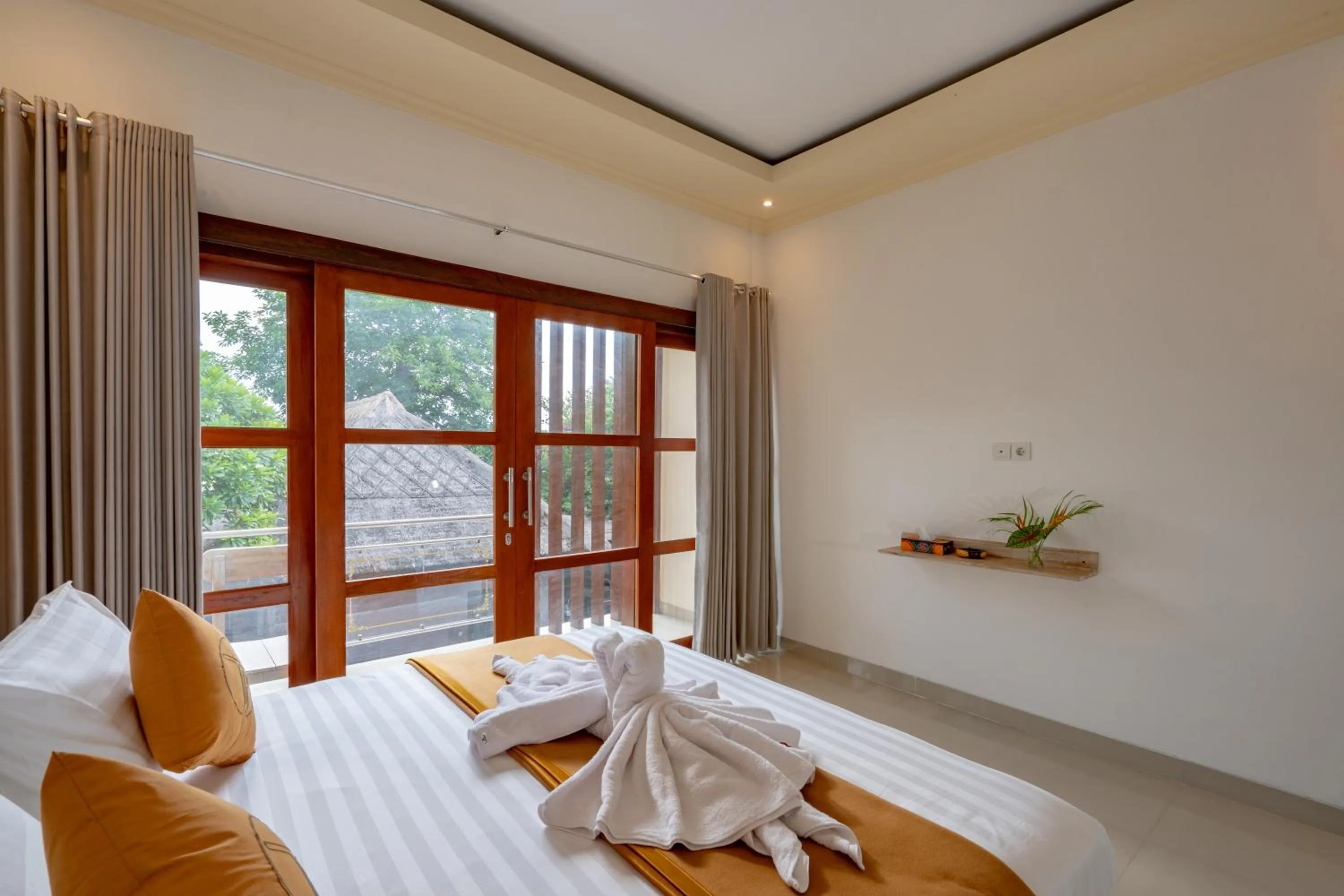 Bed in The Pulau Bungalow