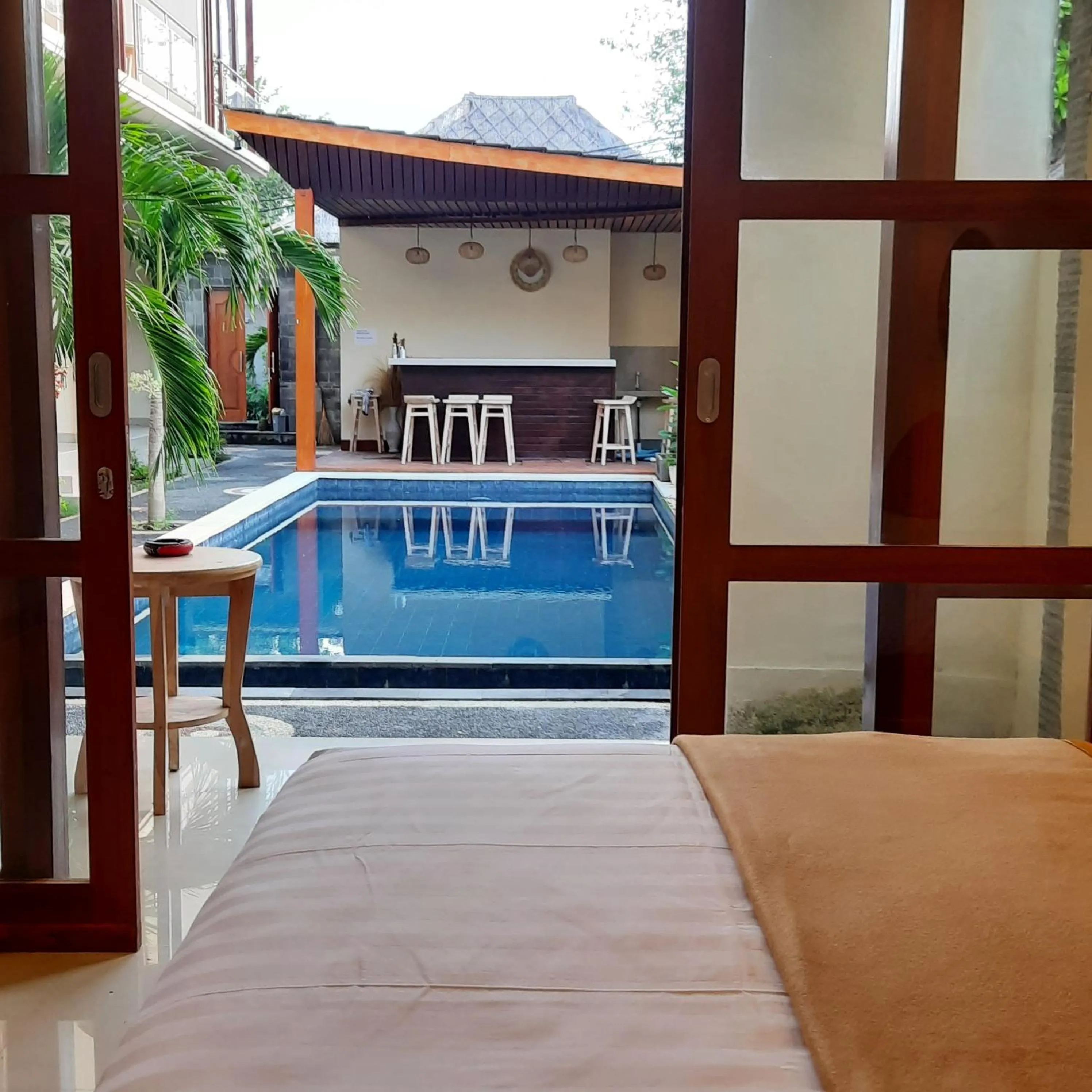 Bed in The Pulau Bungalow