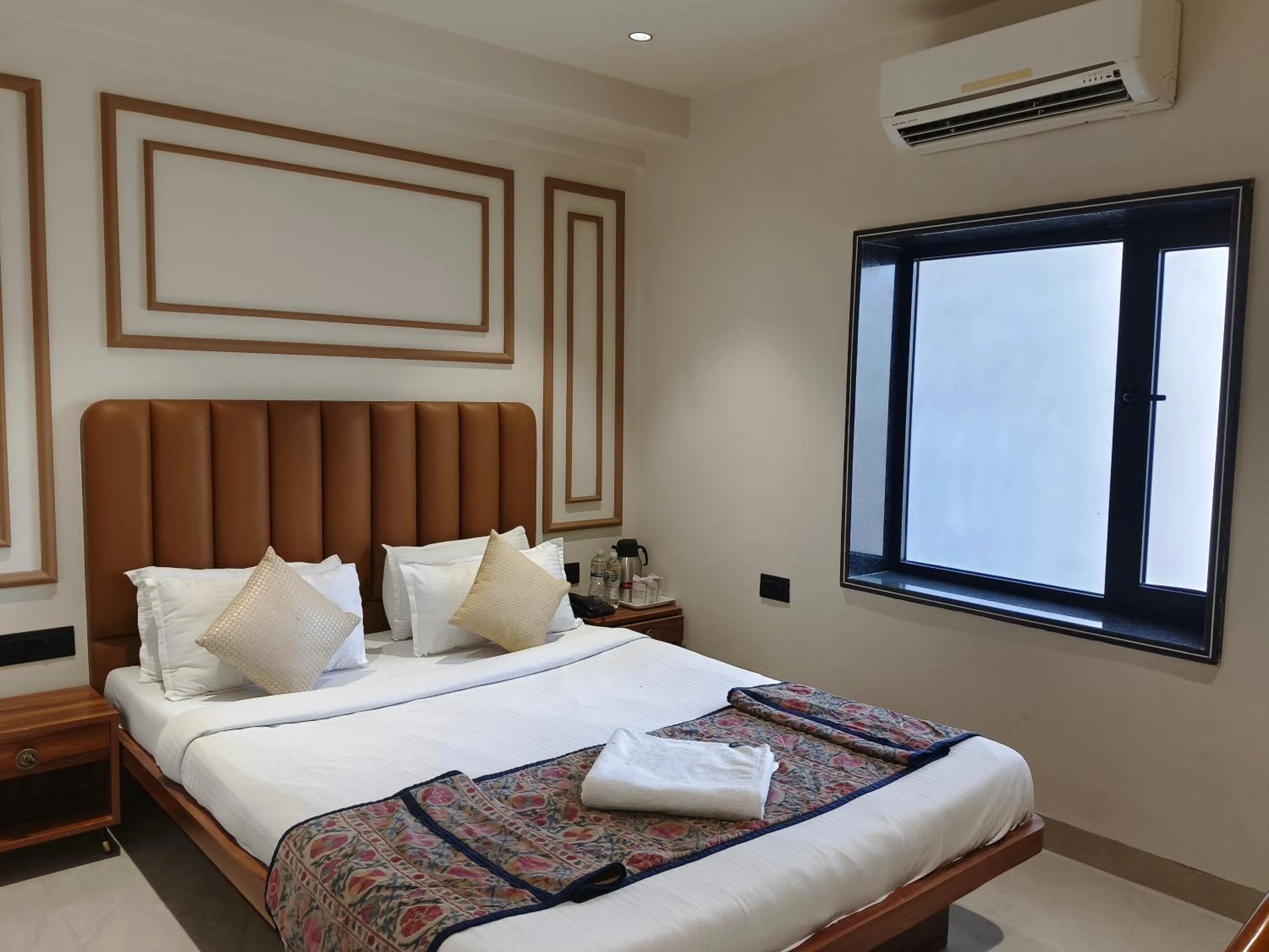 Bed in Hotel Ganpati Palace