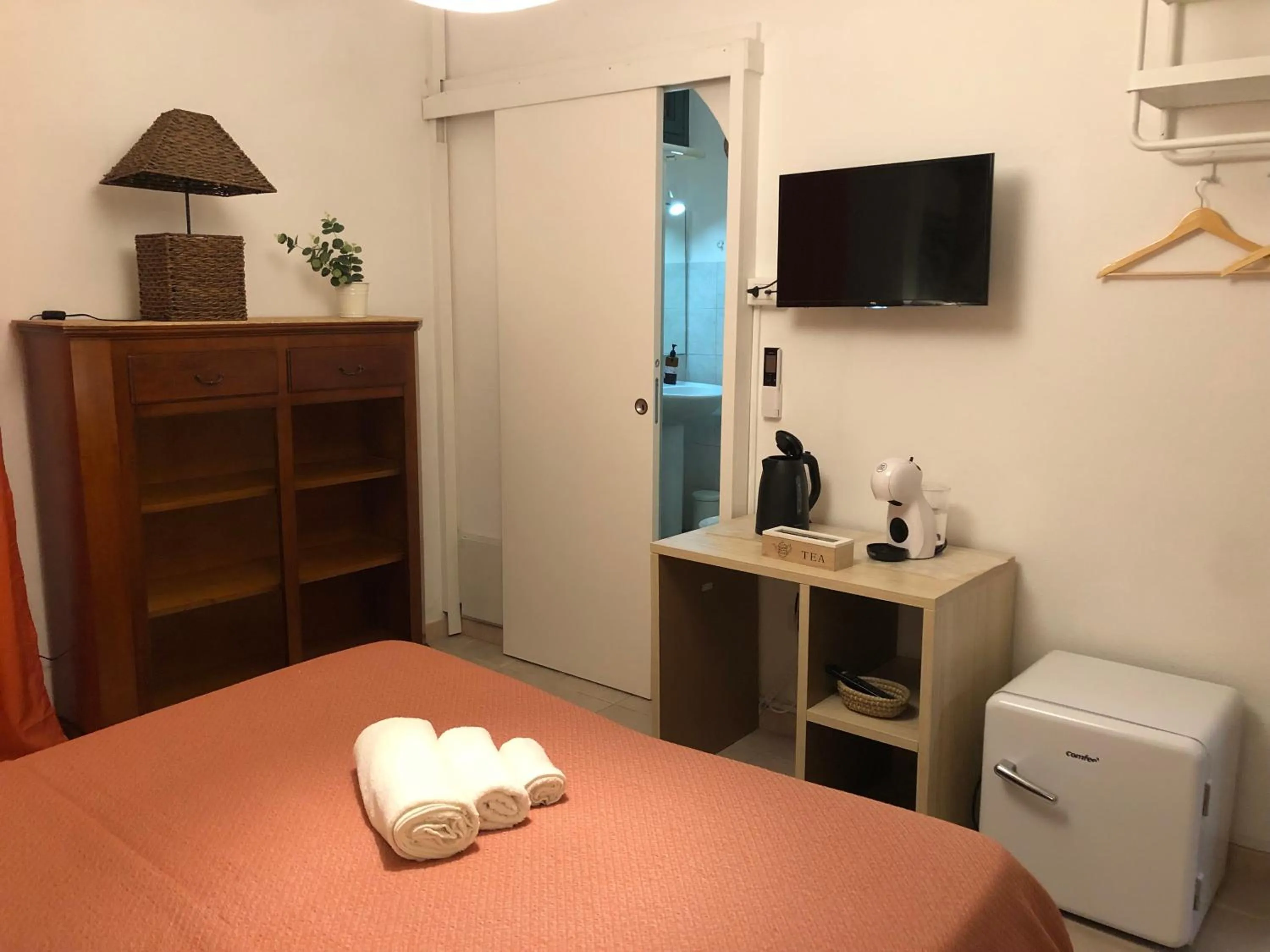 Bed in Assajè Guestroom