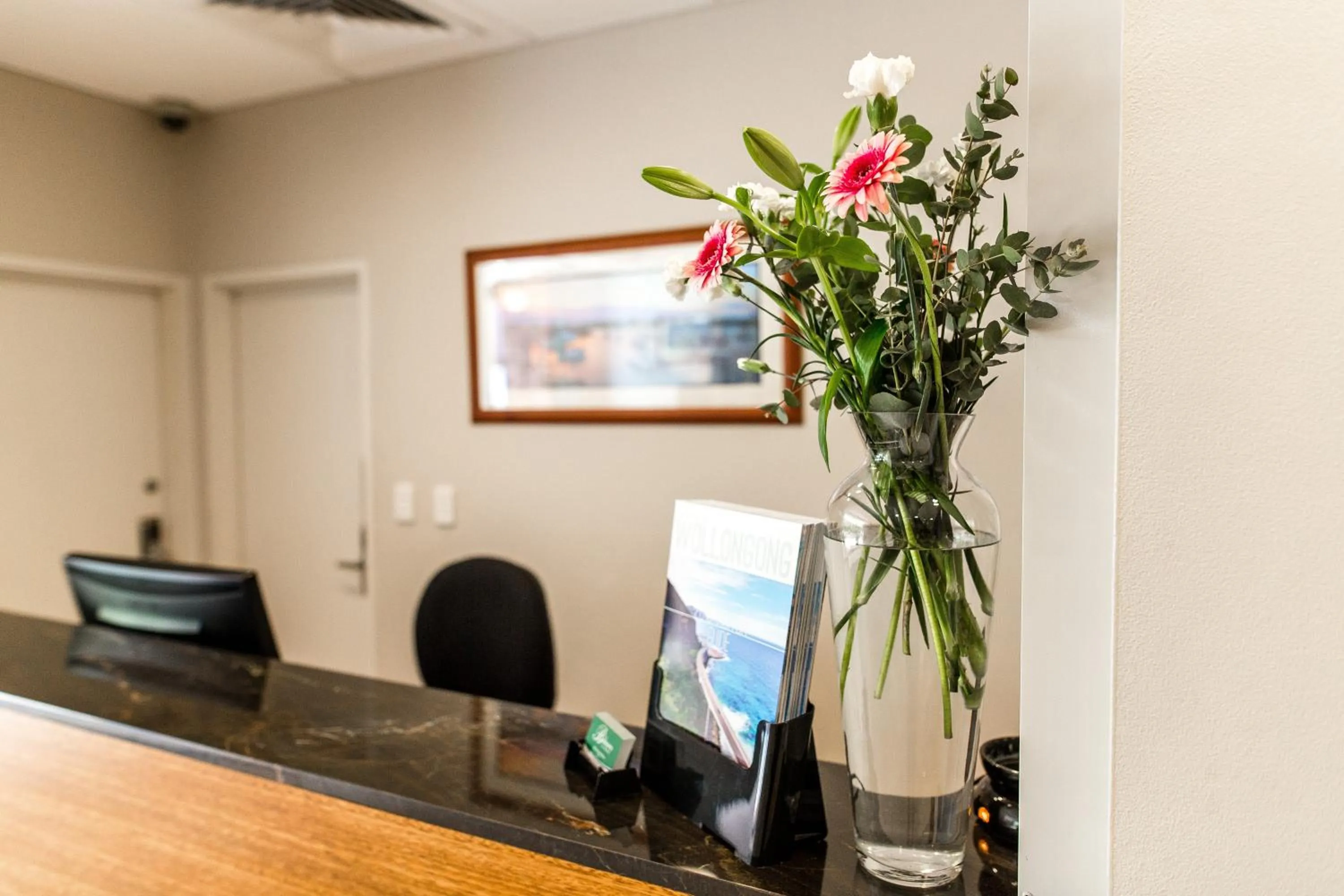 Lobby or reception in The Belmore Apartments Hotel