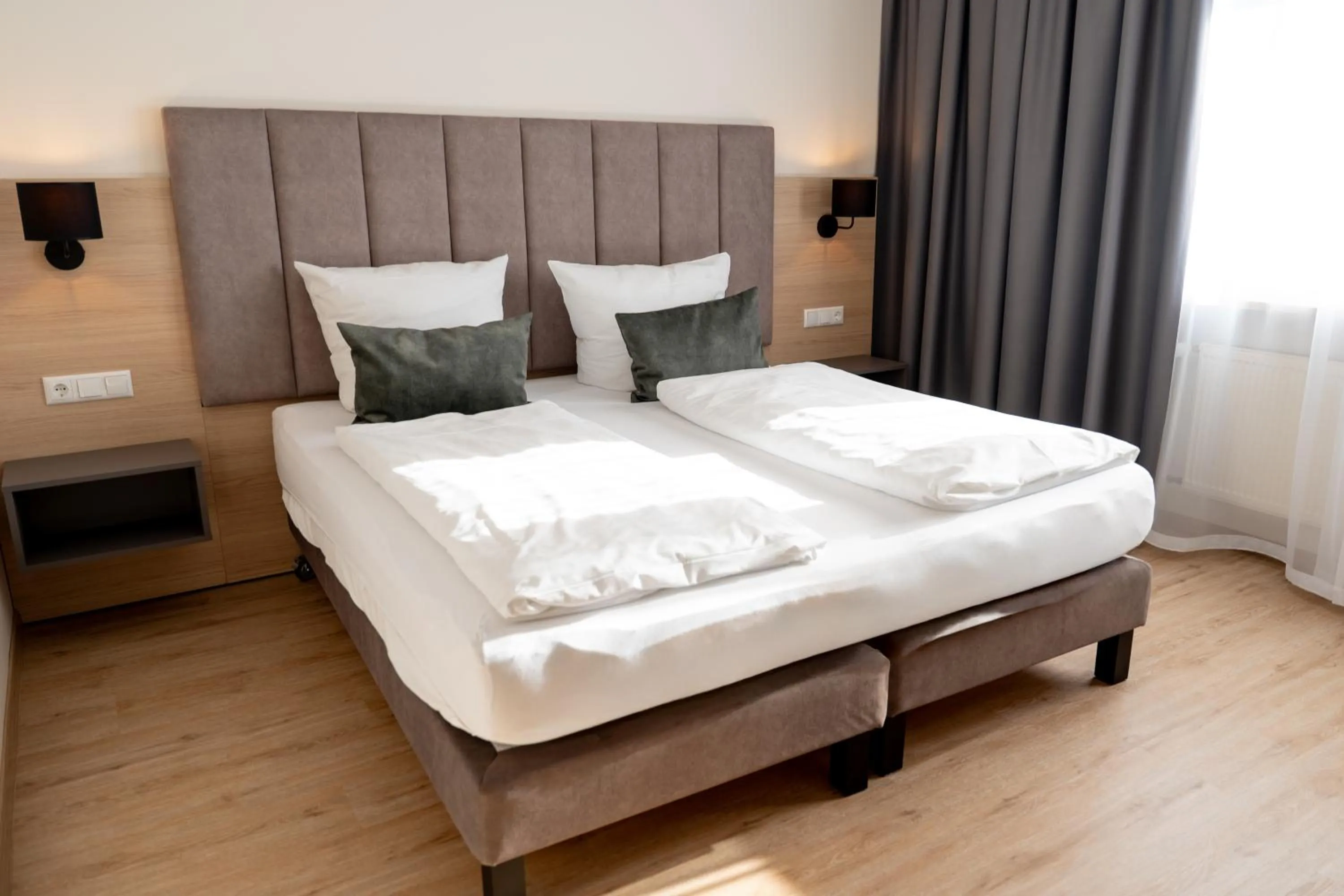 Bed in Stadthotel Lichtenfels