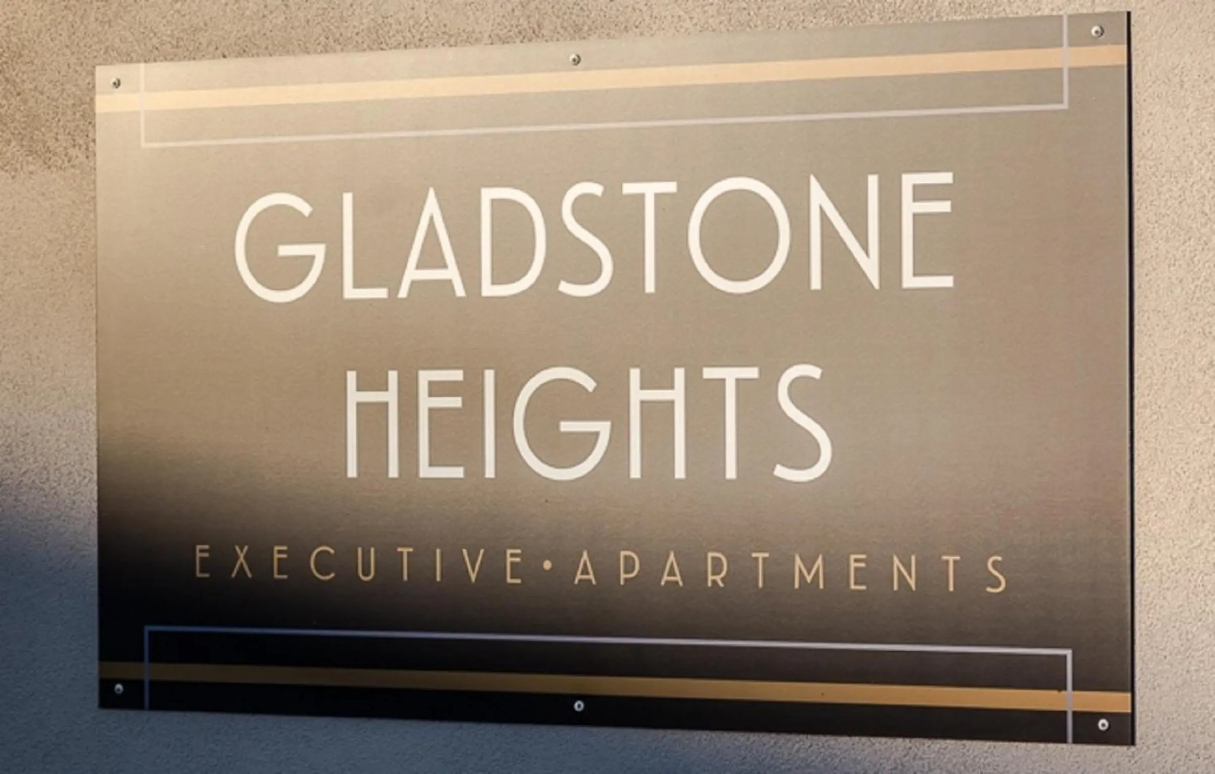 Property logo or sign in Gladstone Heights Executive Apartments