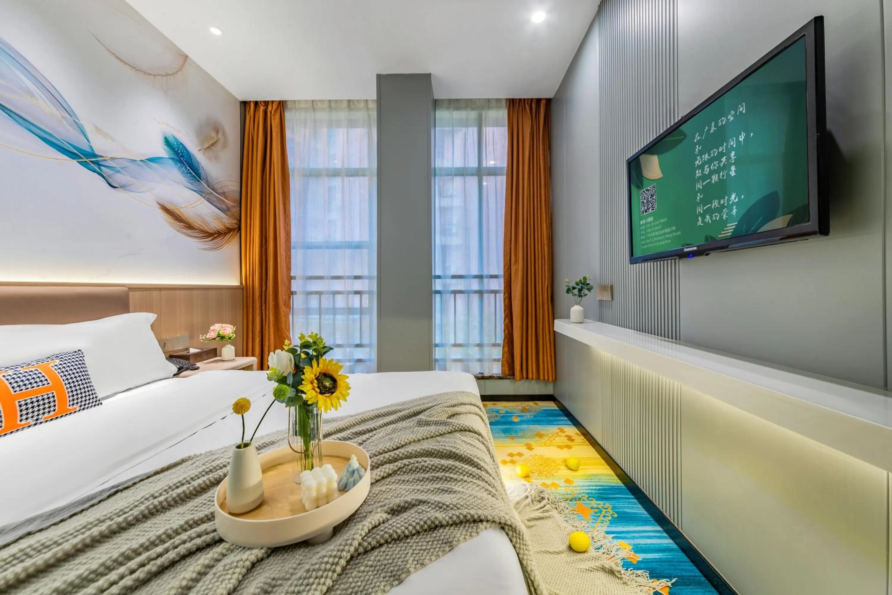 Communal lounge/ TV room, Bed in Xinghe Yuezhi S Hotel to Guangzhou Yuexiu Park Railway Station Subway station