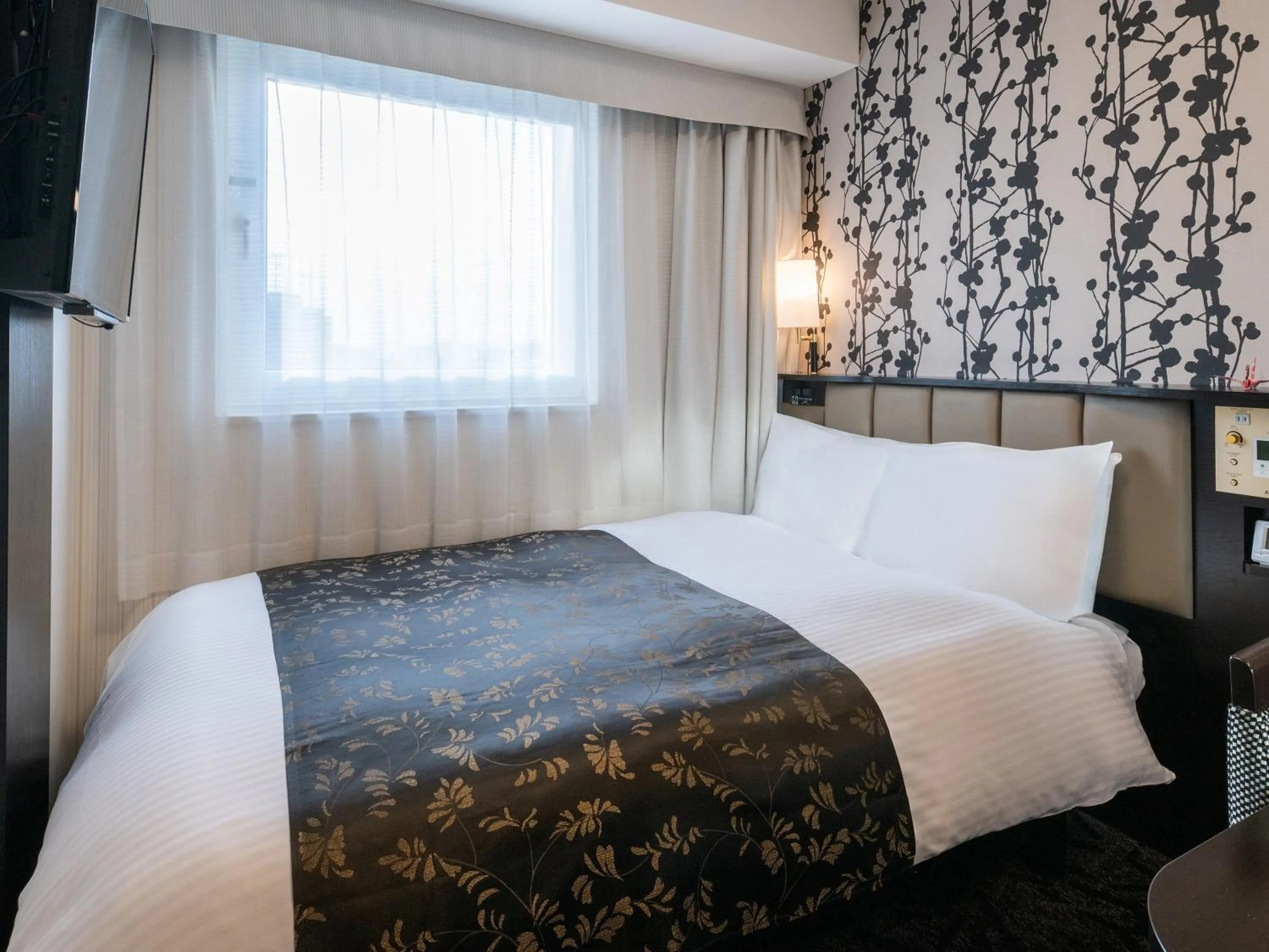 Photo of the whole room, Bed in APA Hotel Nagoya Ekimae Minami