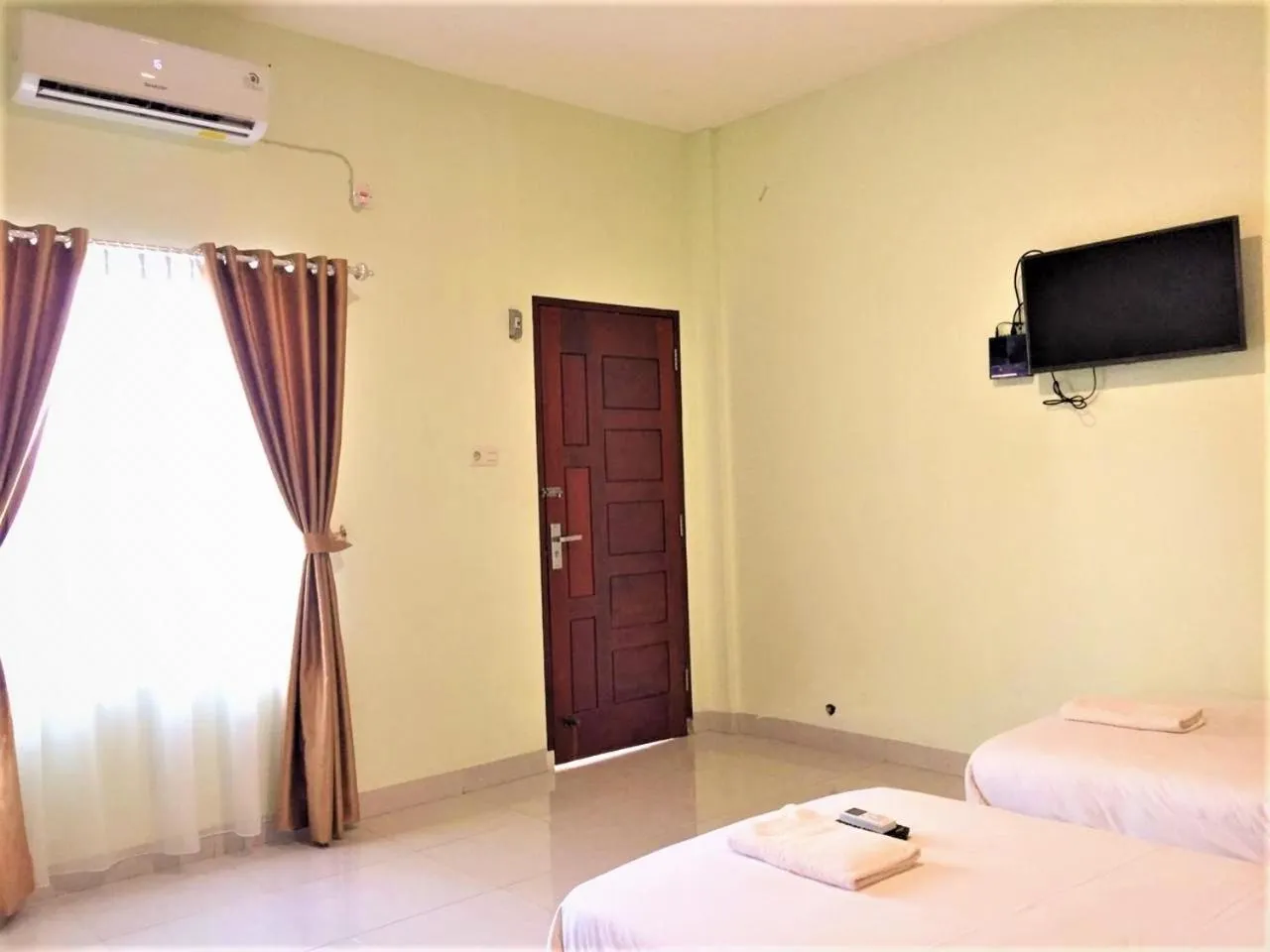 Bed in Hotel The Village Syariah