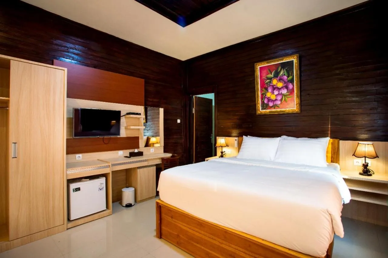 Communal lounge/ TV room, Bed in Nusa Sedayu Hotel By Ocean View
