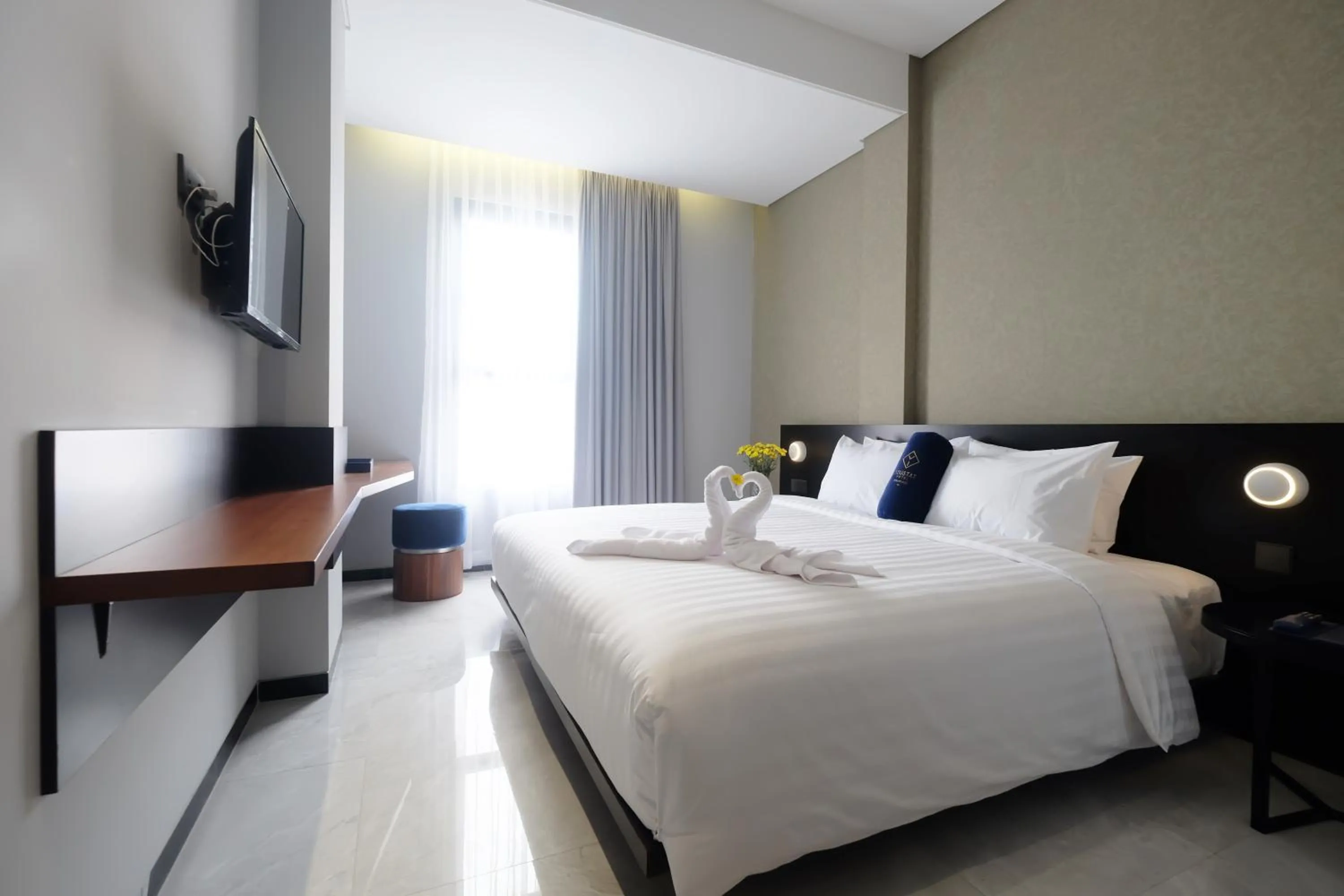 Bed in Hotel Youstay Semarang by Sinergi