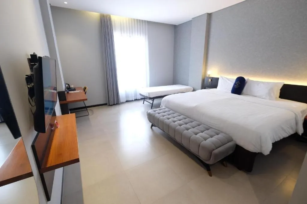 Bed in Hotel Youstay Semarang by Sinergi
