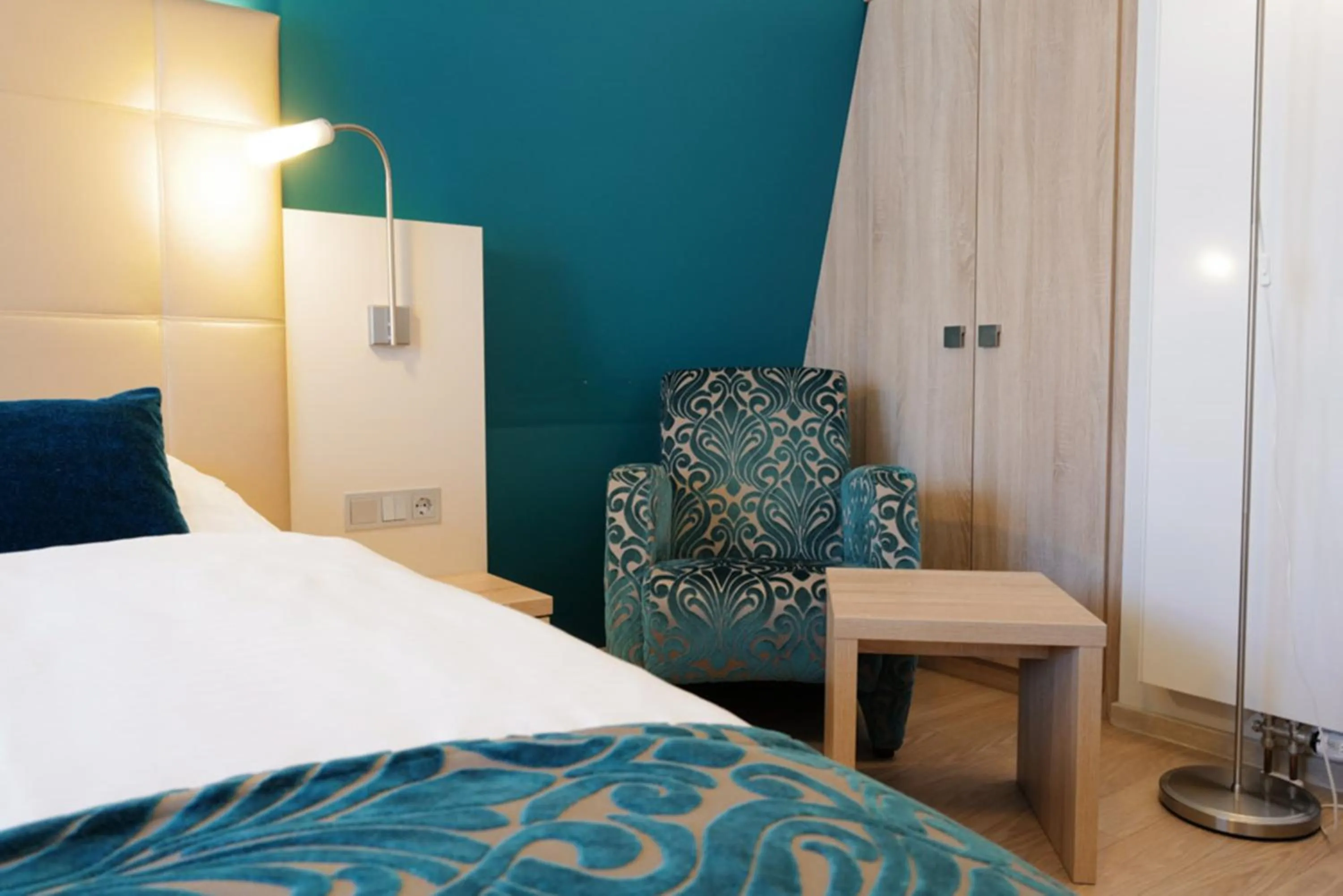 Seating area, Bed in Hotel Trapp