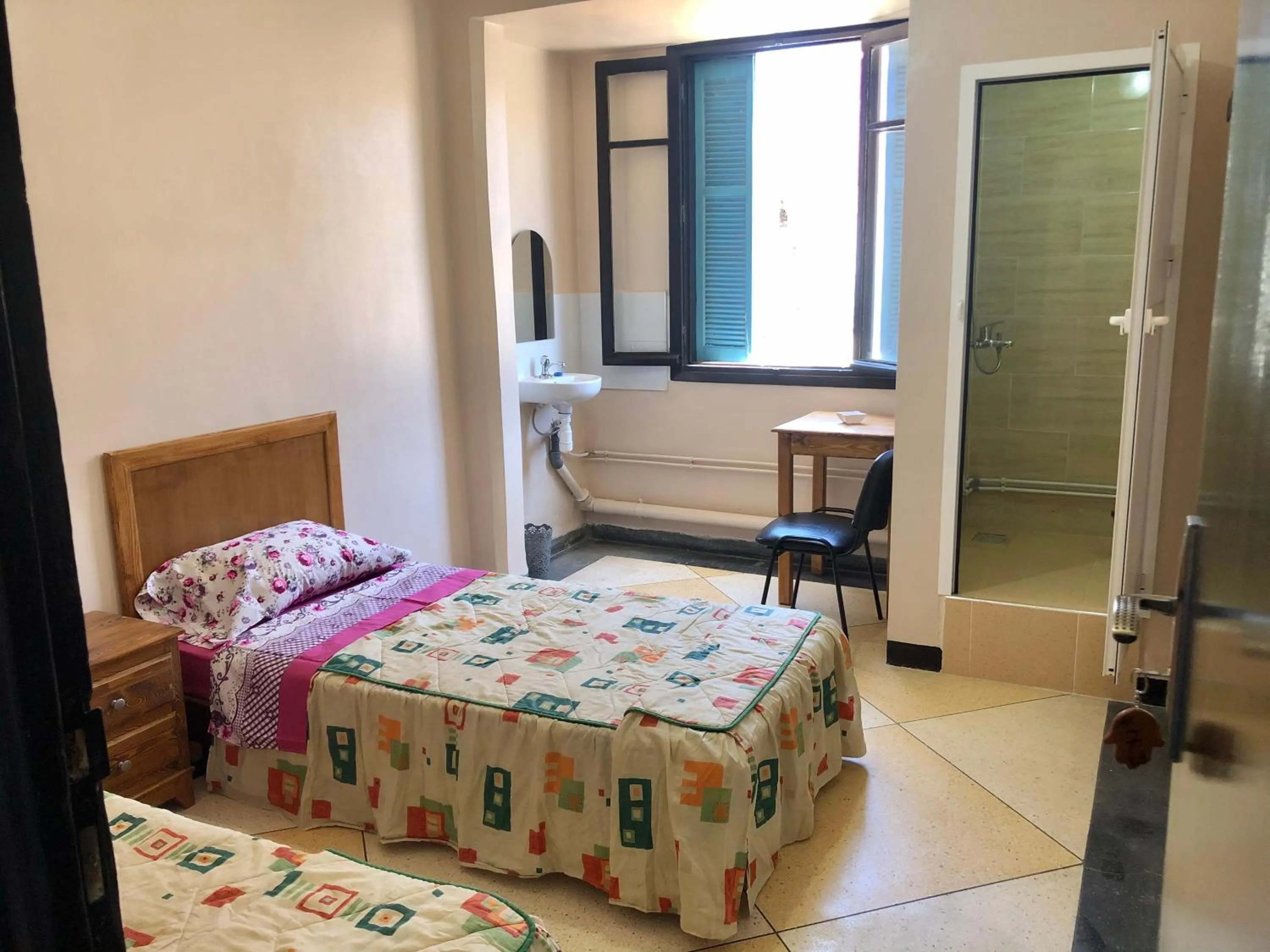 Bed in Hotel El Maghreb Al Kabir