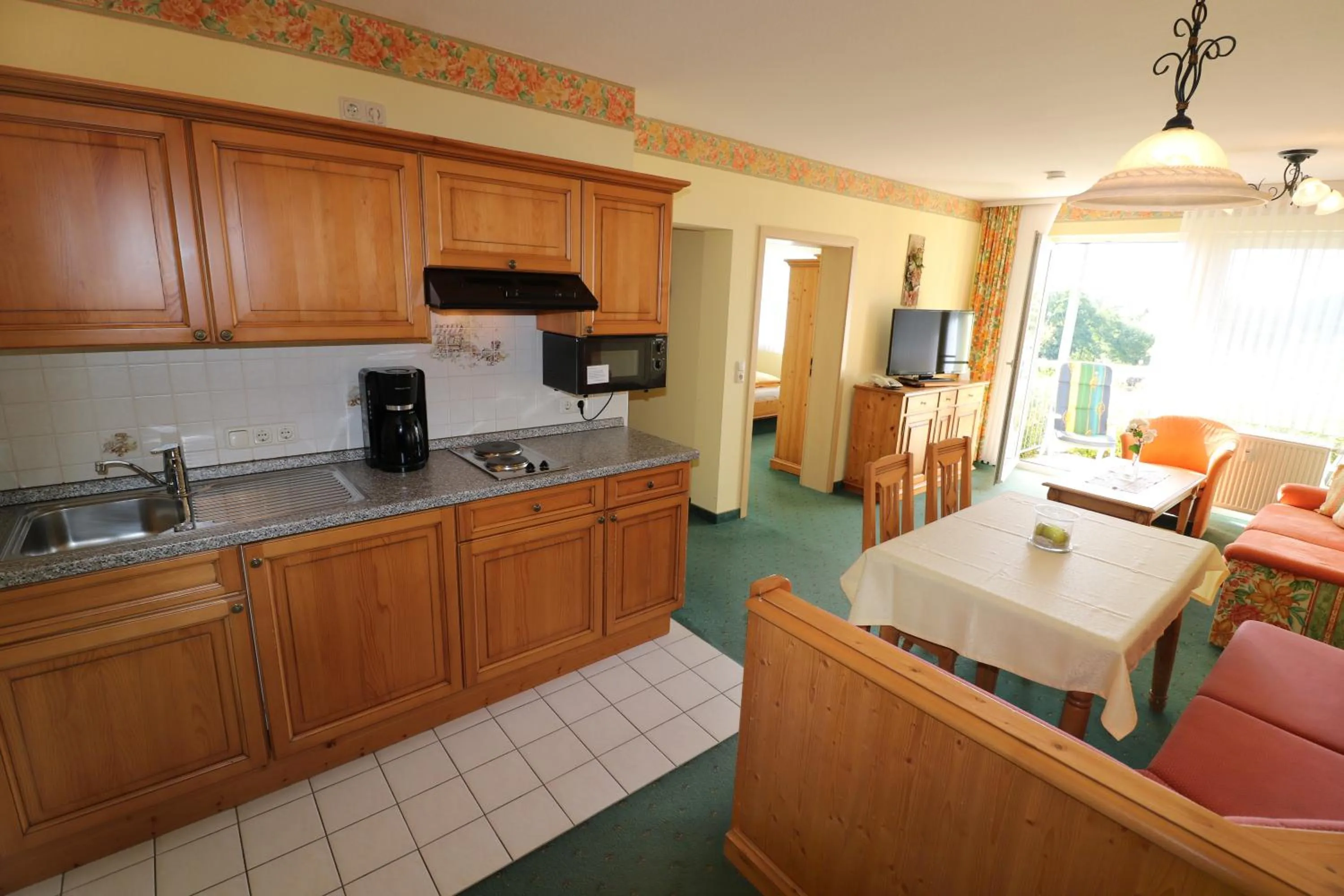 Kitchen or kitchenette in Ferienwohnung Zur Hopfenkönigin