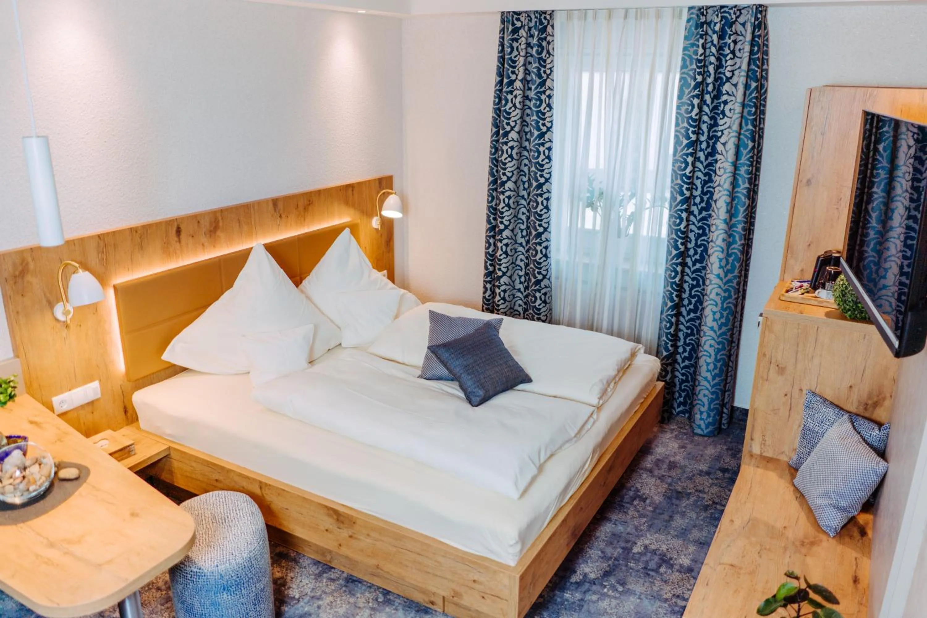 Bed in Garni-Hotel Goldenes Lamm