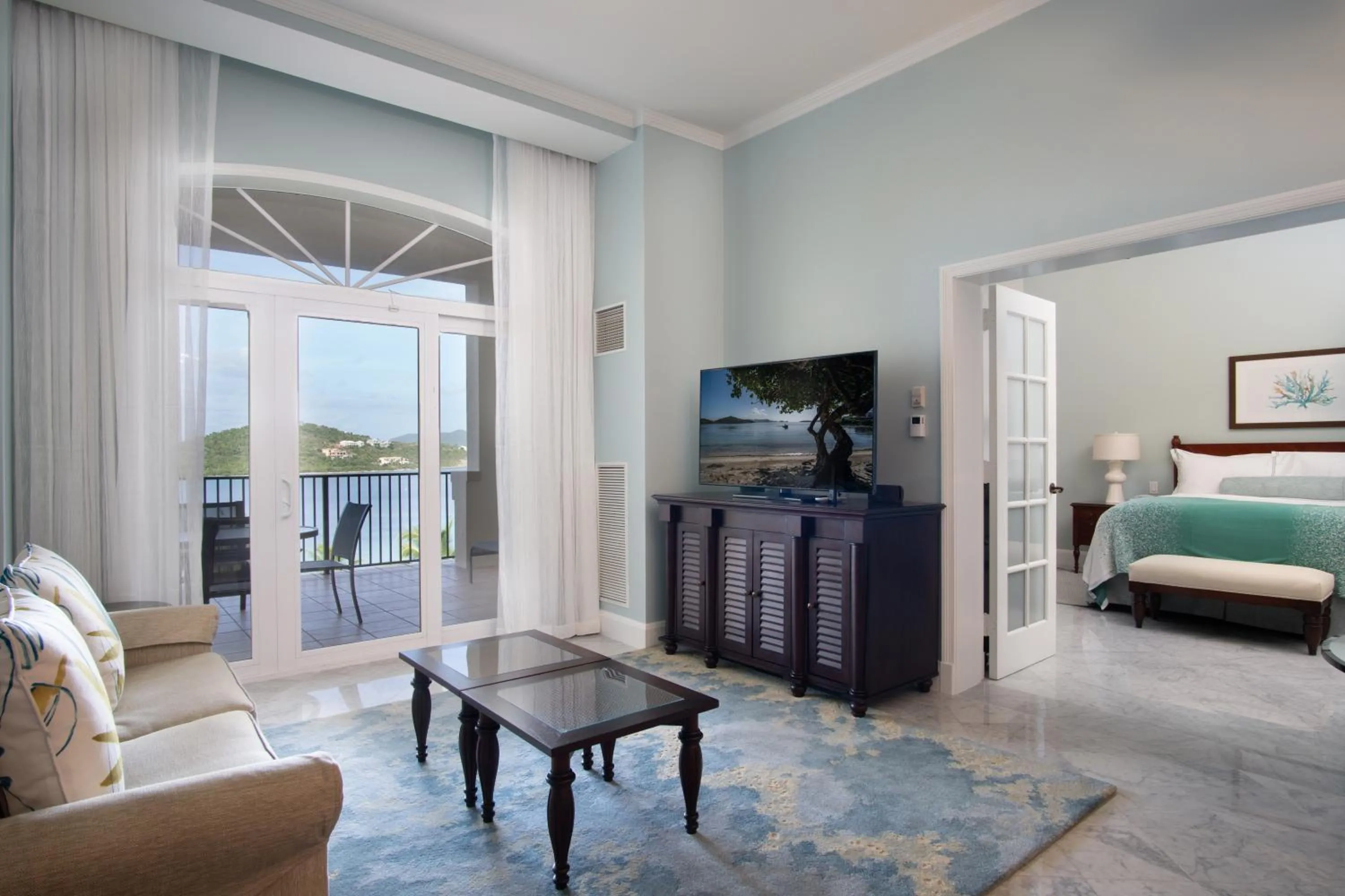 Living room, Bed in Great Bay Condominiums located at The Ritz-Carlton Club, St Thomas