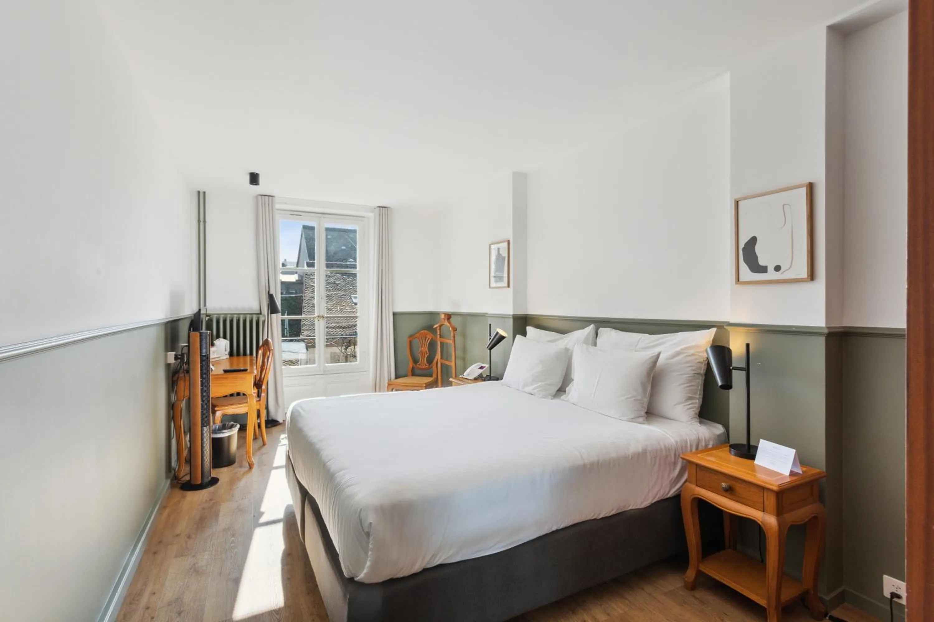 Photo of the whole room, Bed in Hôtel de la Couronne