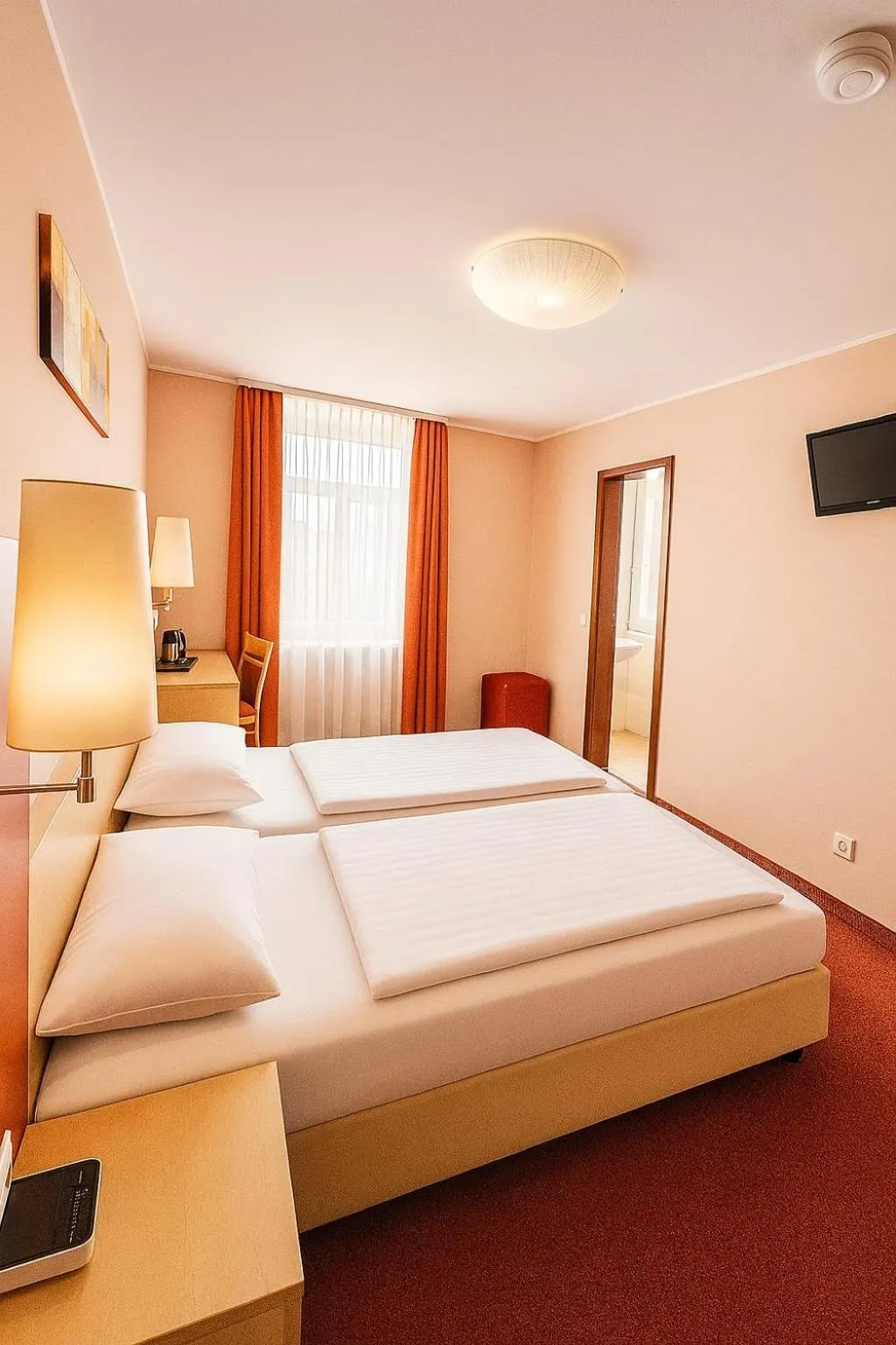 Photo of the whole room, Bed in Atomis Hotel Düsseldorf City