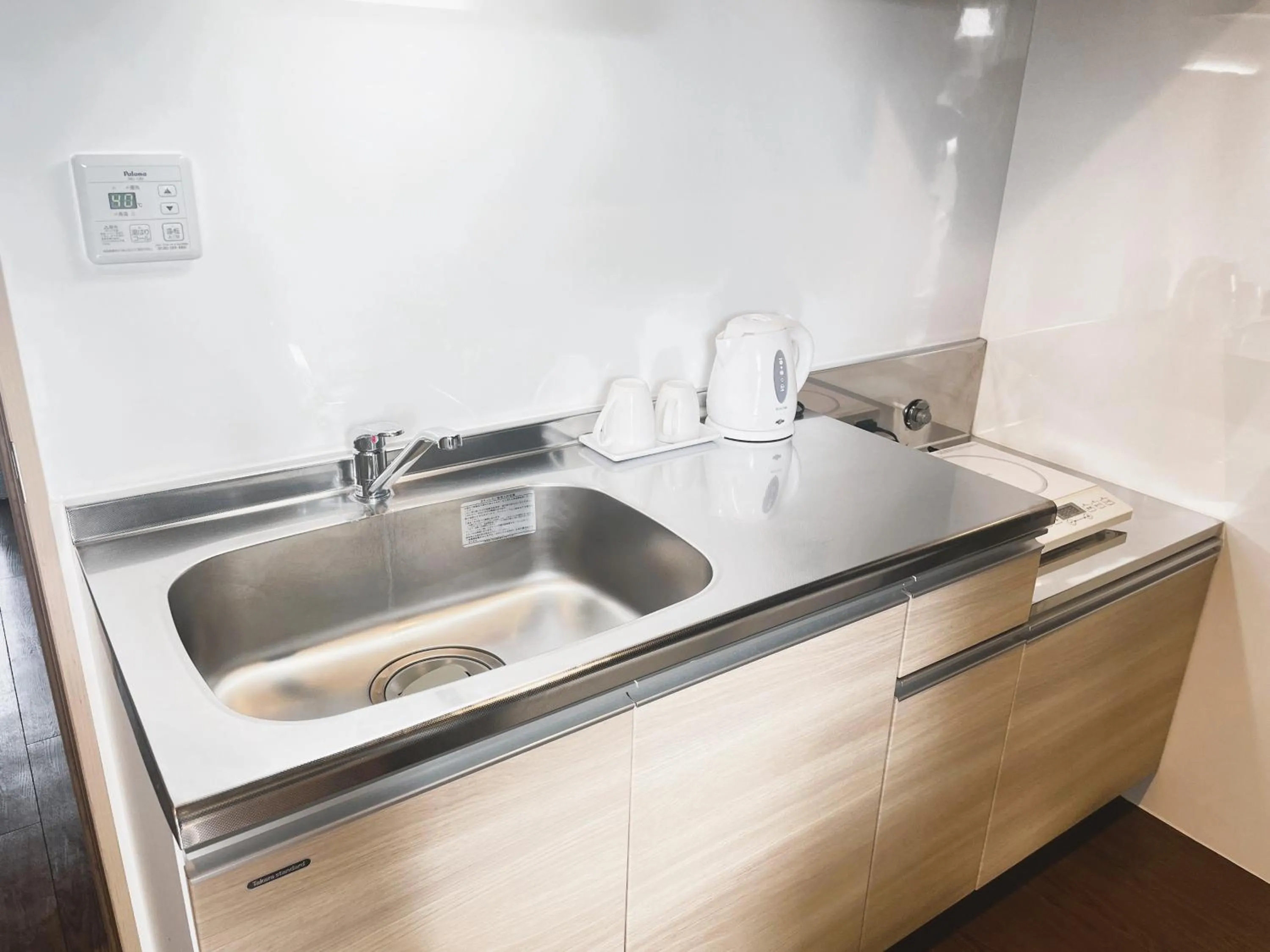 Kitchen or kitchenette in BiBi Hotel コンベンションベイ