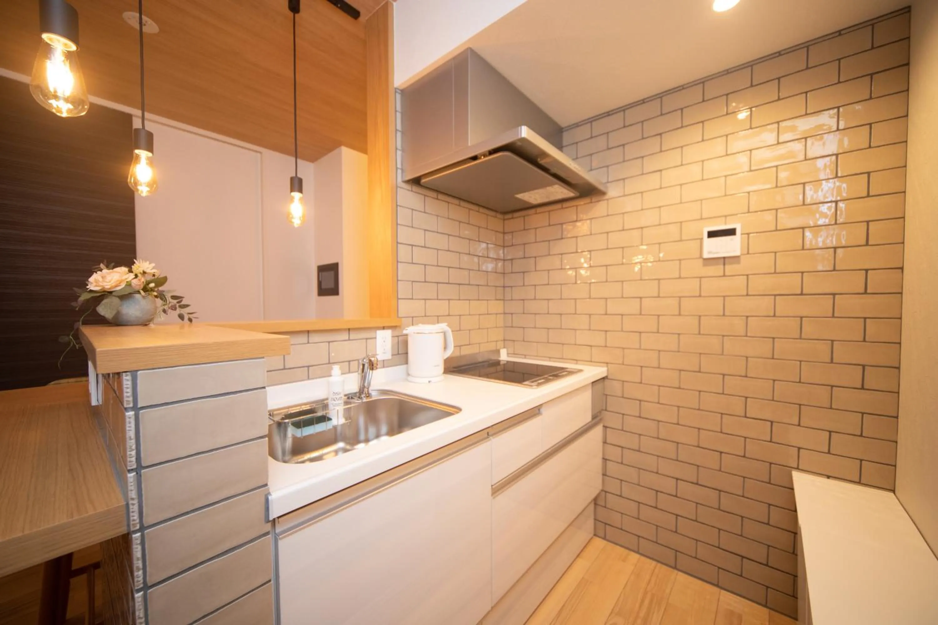 Kitchen or kitchenette in HOTEL&CO