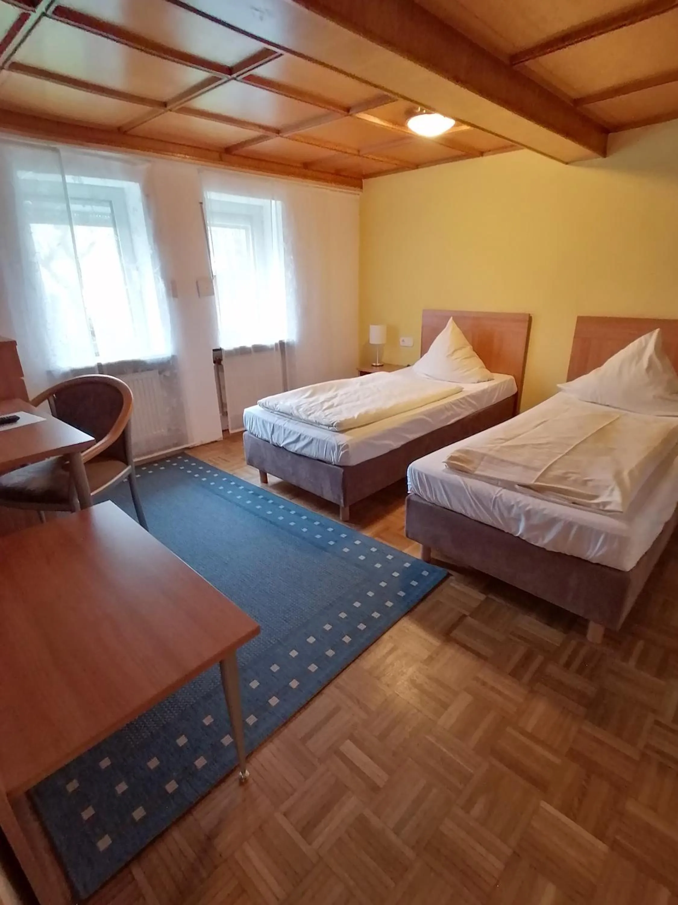 Photo of the whole room, Bed in Landhotel Adler