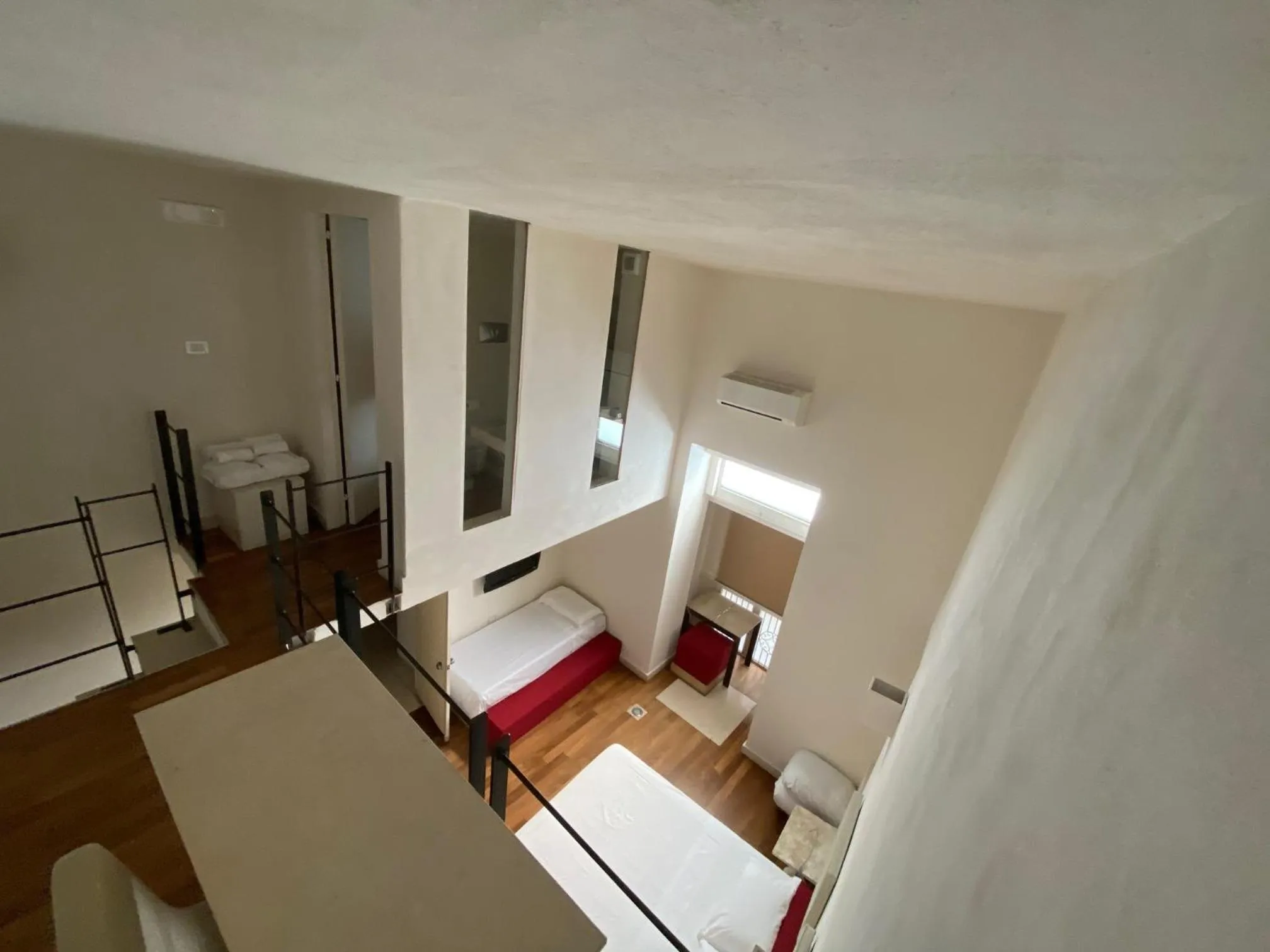 Bed in Micalò Art Rooms