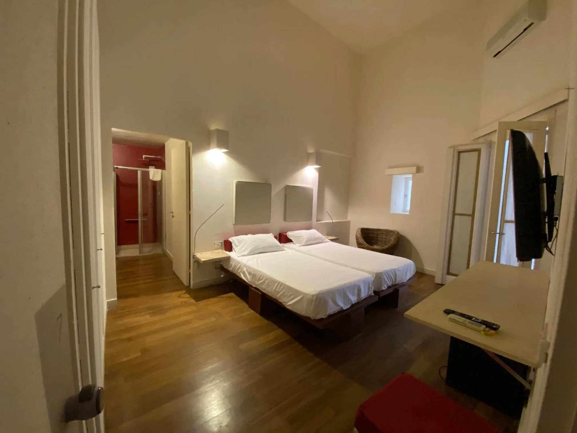 Bed in Micalò Art Rooms