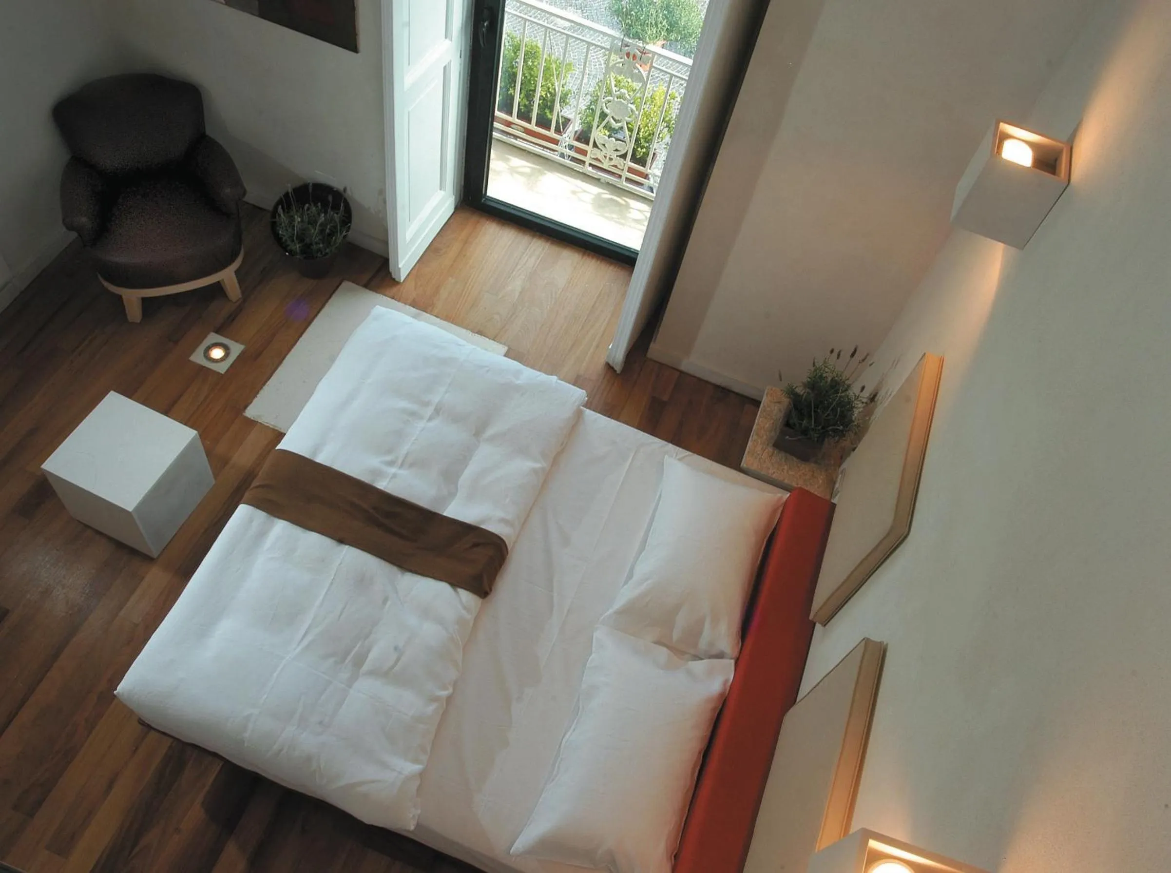 Bed in Micalò Art Rooms