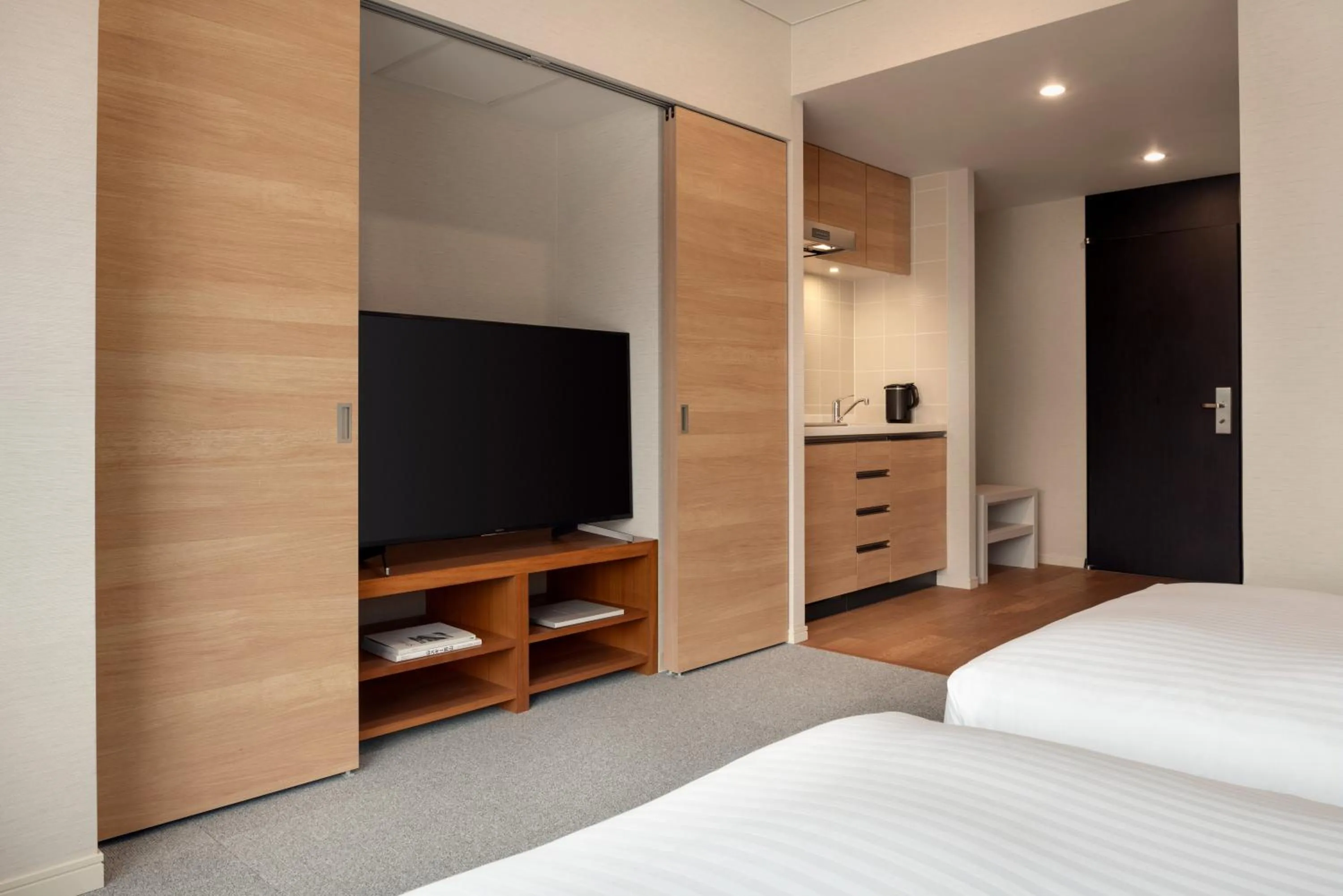 Kitchen or kitchenette, Bed in Chatrium Niseko Japan