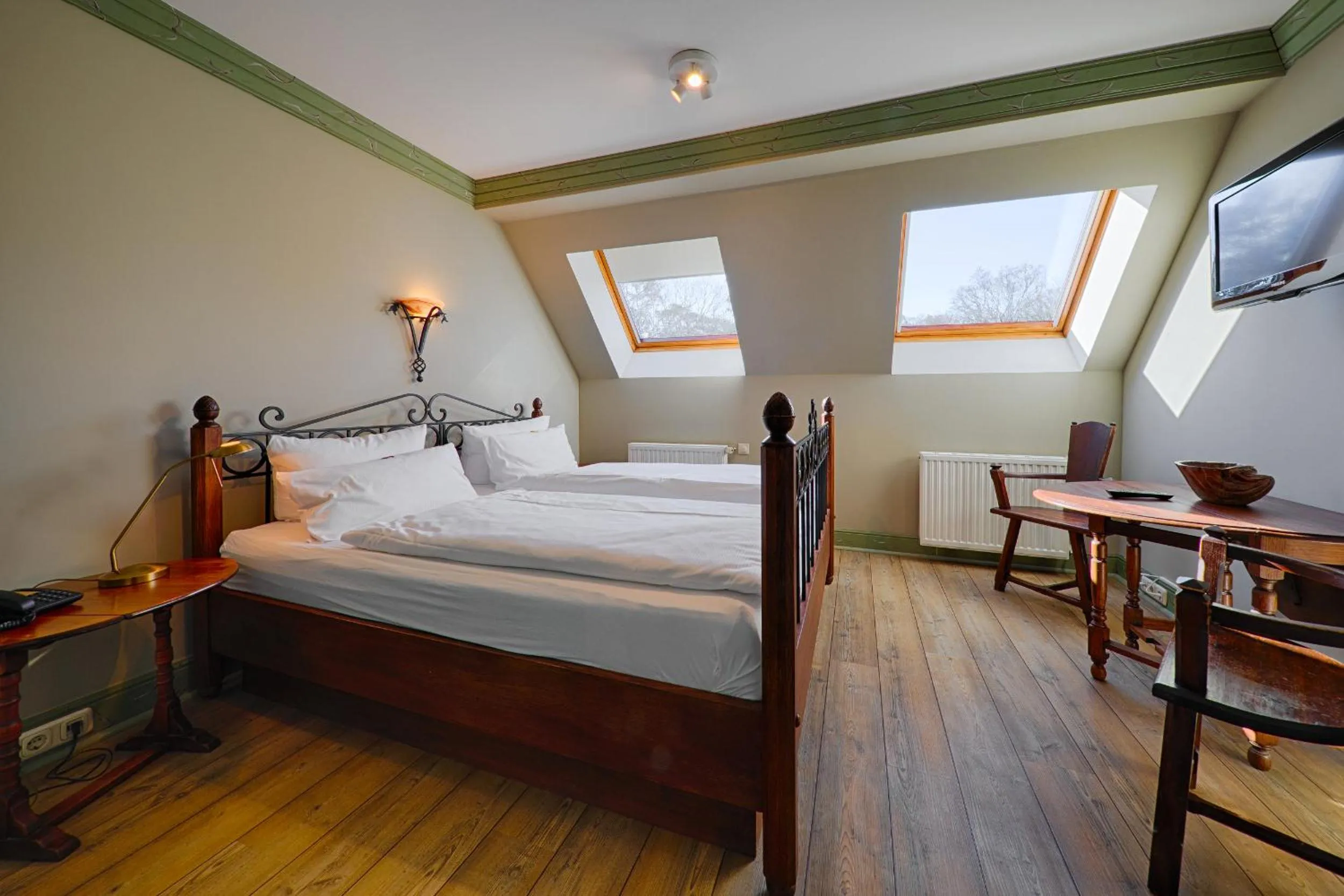 Photo of the whole room, Bed in Meeressterne Hotel Forsthaus Damerow
