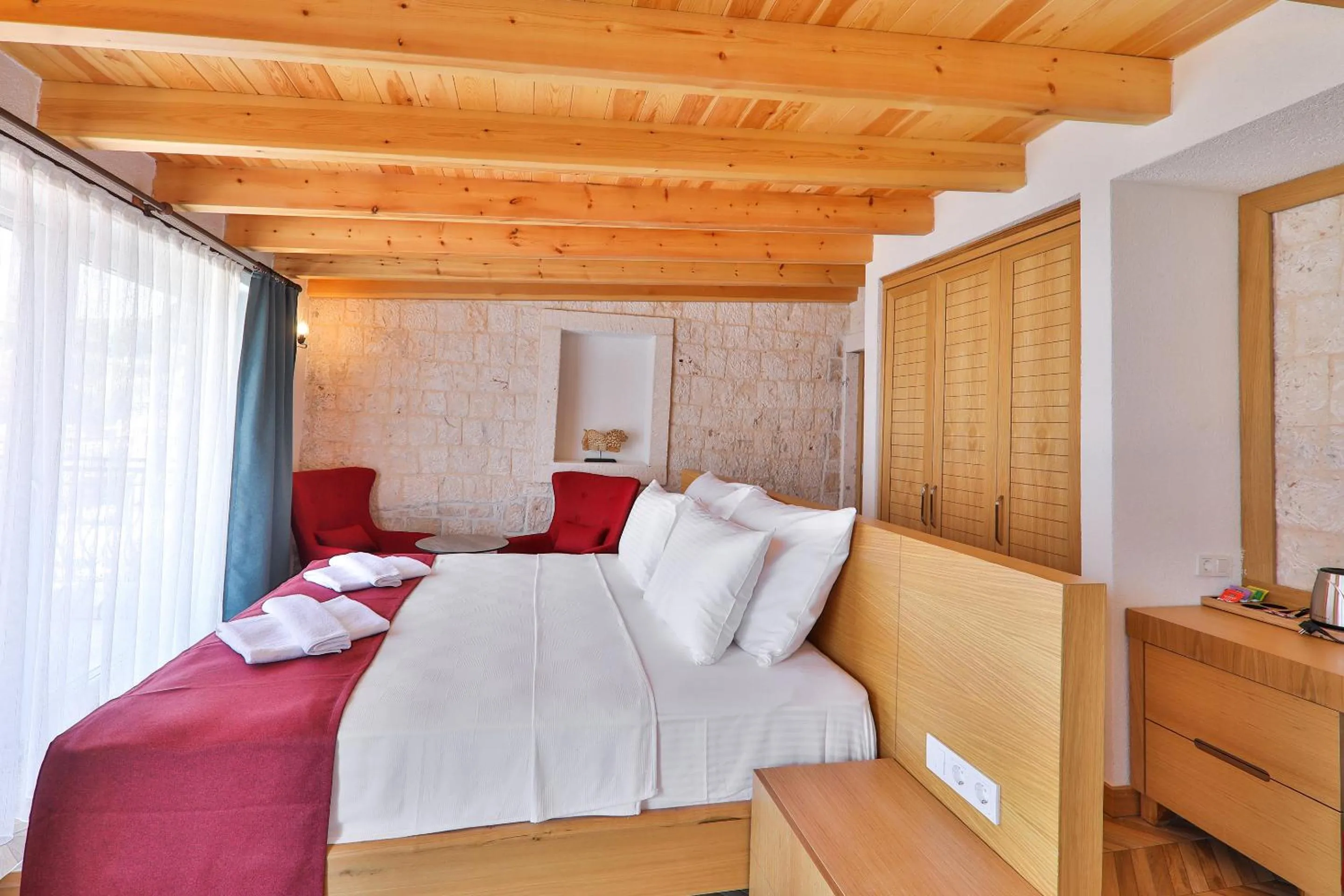 Bed in Atalante Hotel