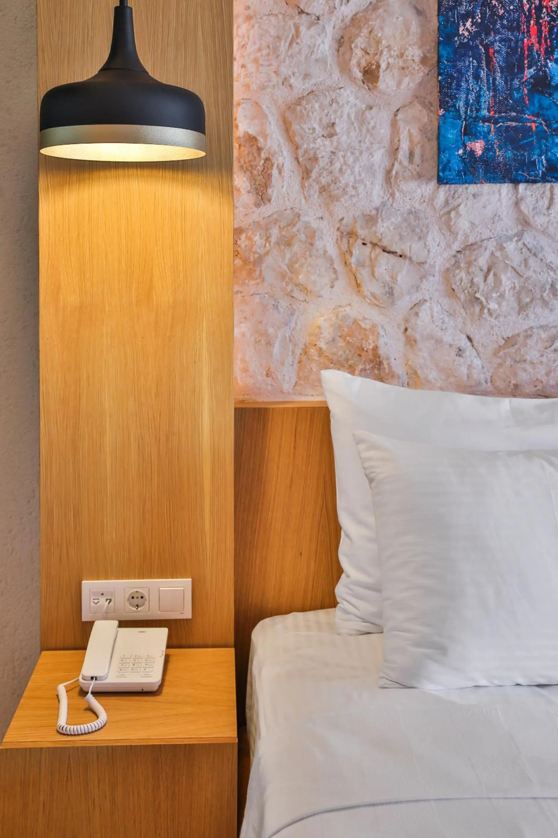 Bed in Atalante Hotel