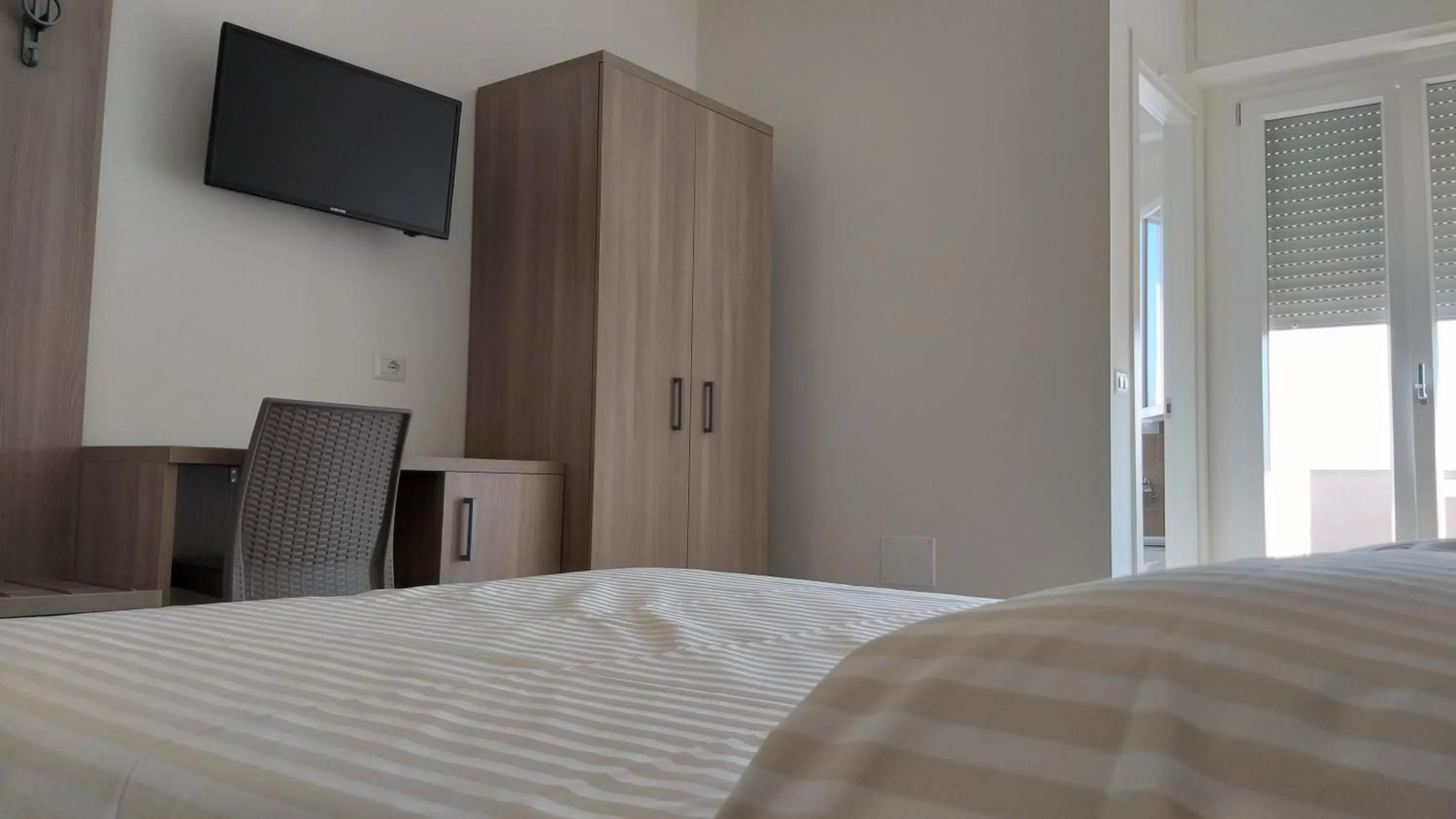 Bed in HOTELRISTORANTE IL PUNTO