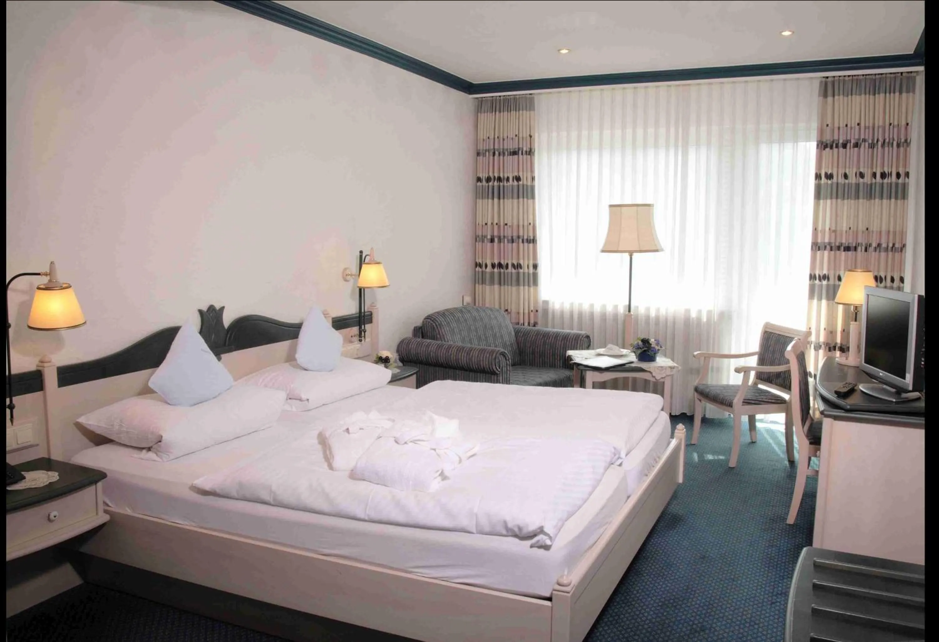 Photo of the whole room, Bed in Wellnesshotel Bürgerstuben