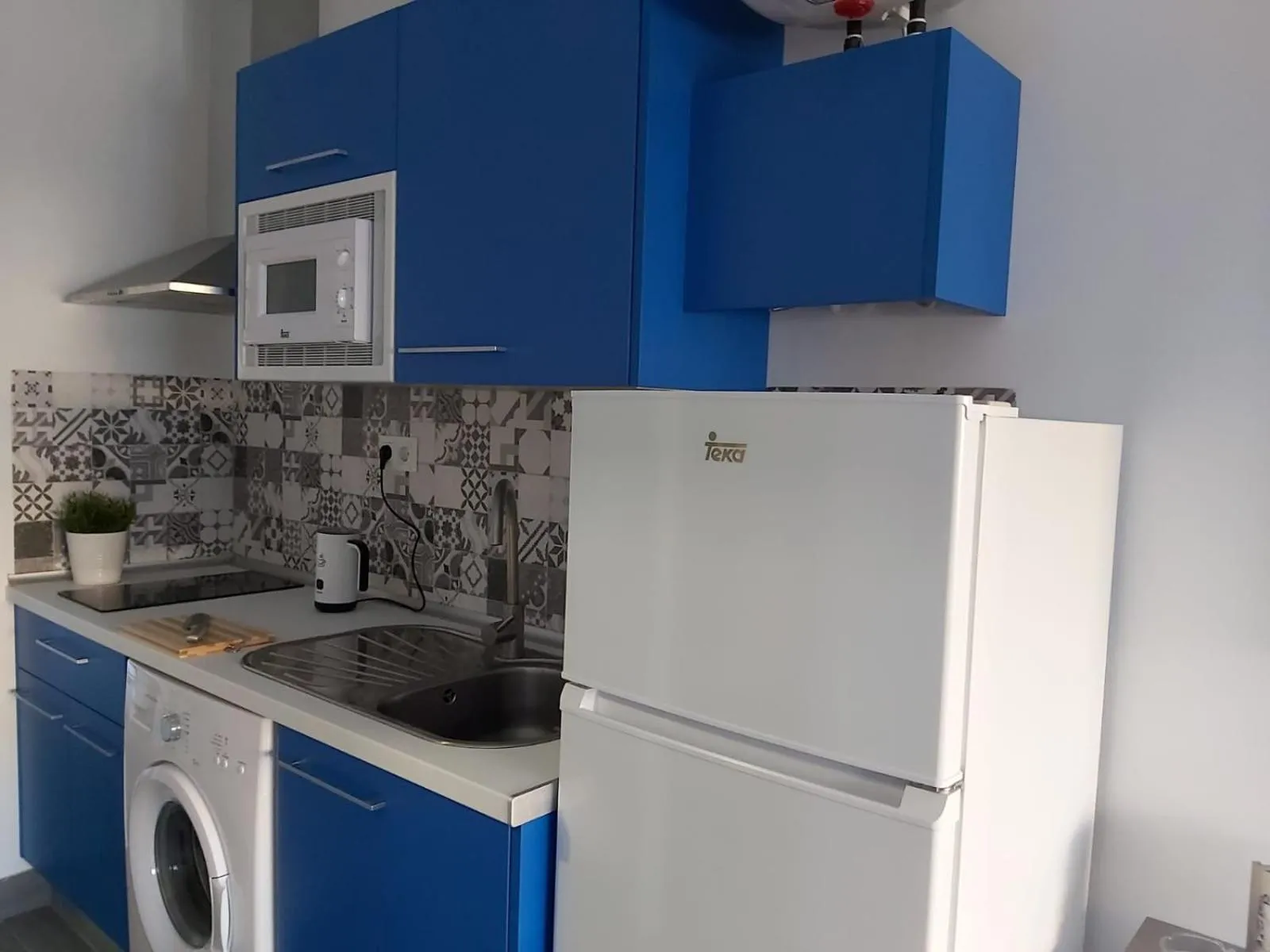 Kitchen or kitchenette in Bnbook Medea Apartments