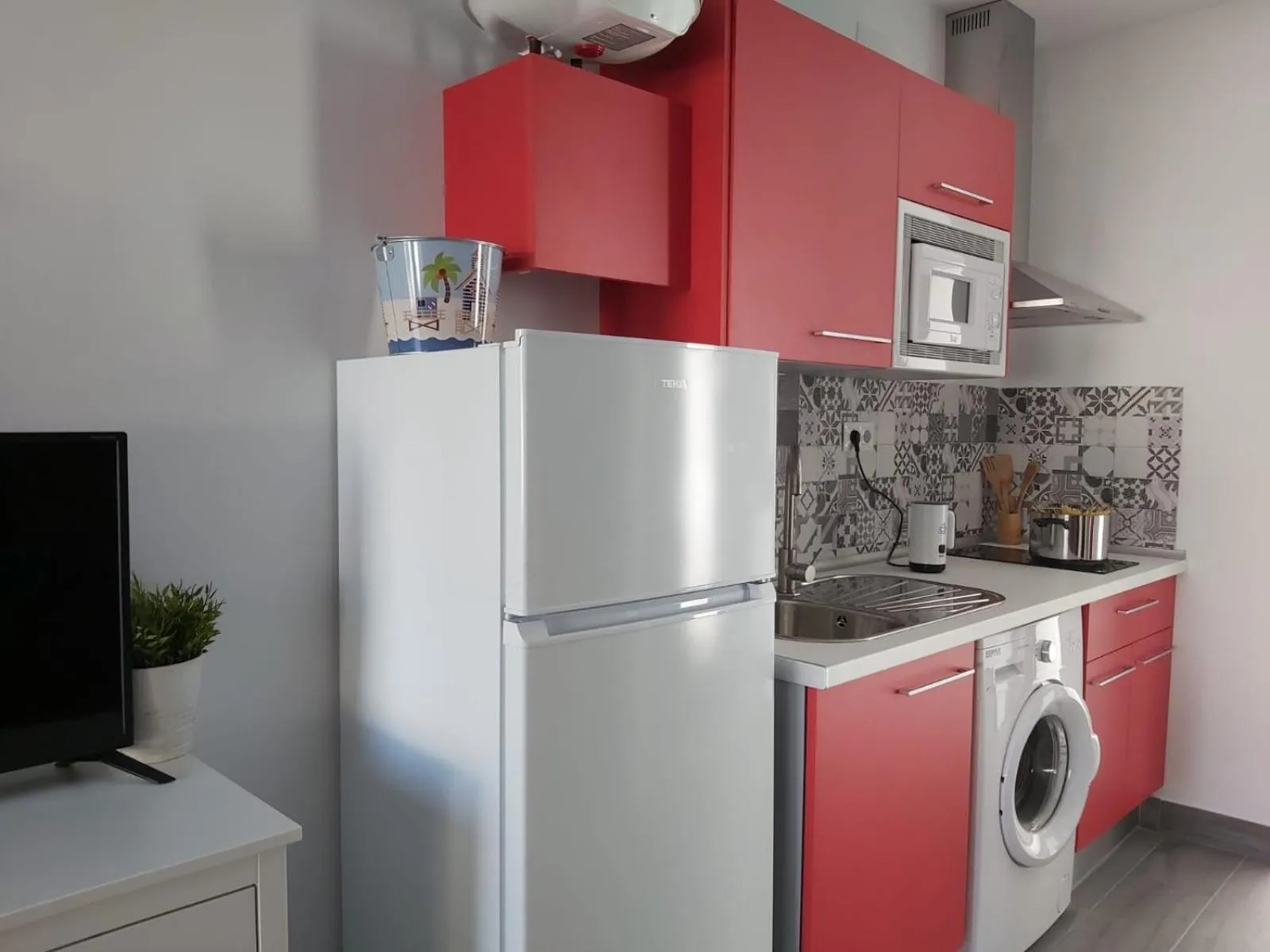 TV and multimedia in Bnbook Medea Apartments