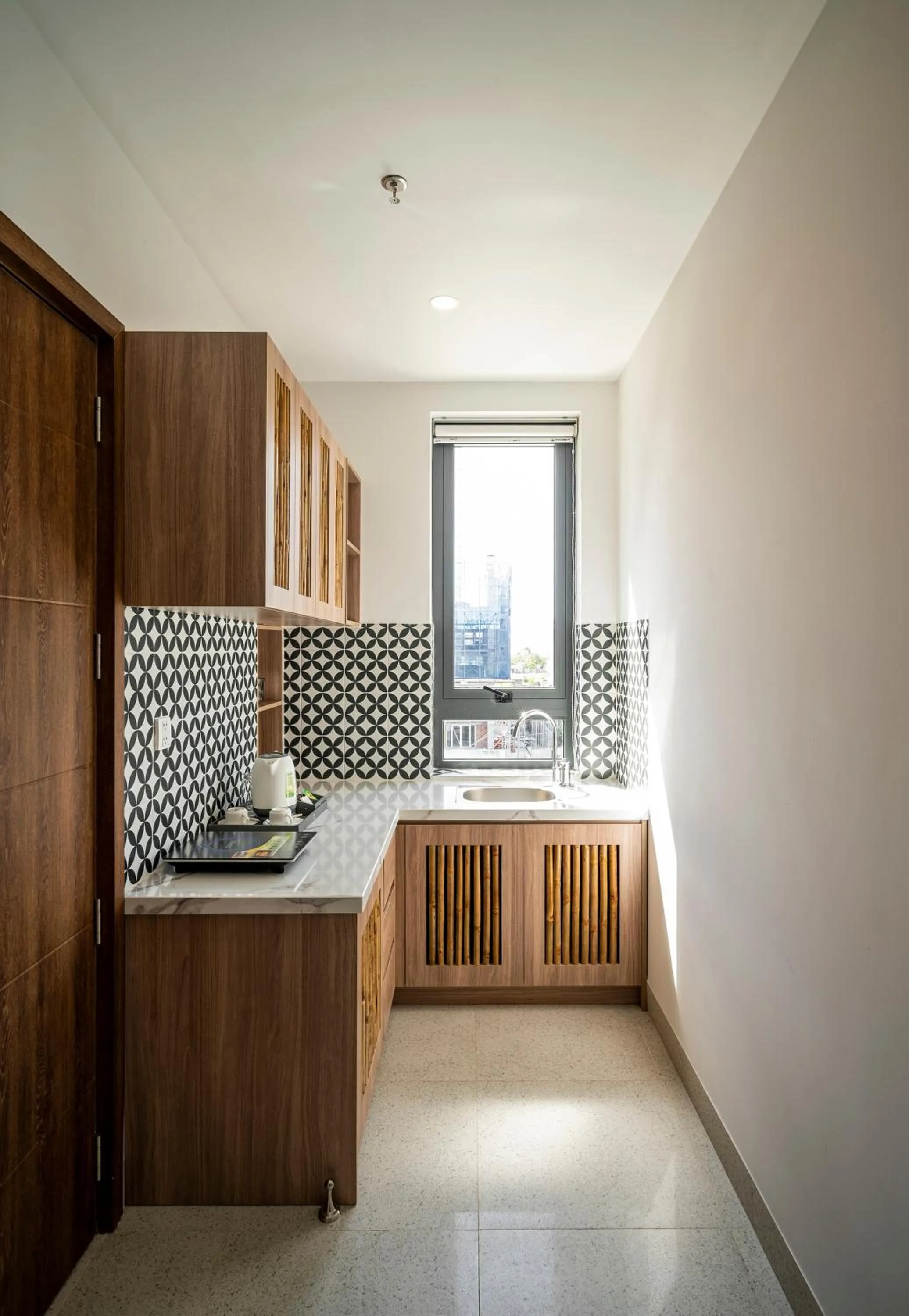 Kitchen or kitchenette in The Kila Boutique Hotel