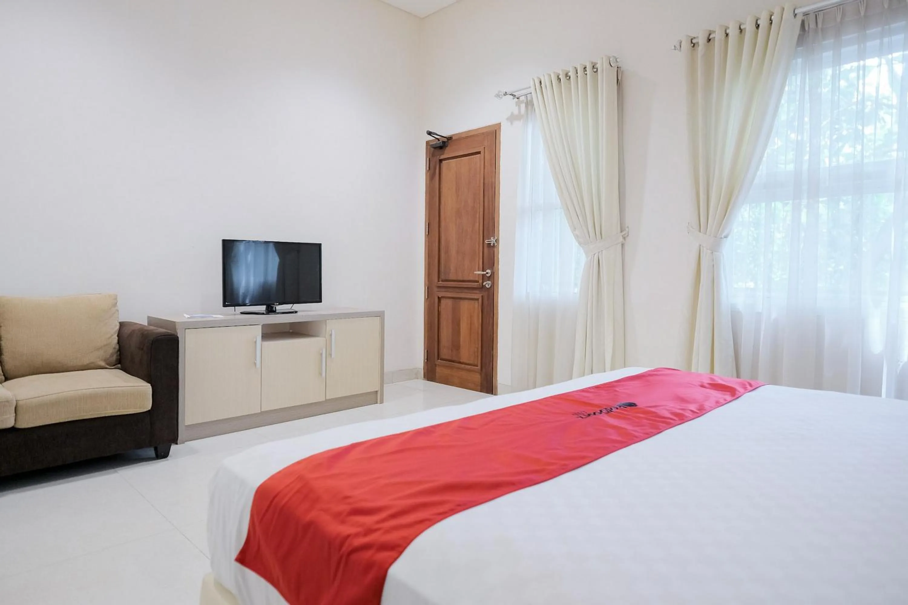 Bed in RedDoorz at Hotel Negeri Baru Kalianda Lampung