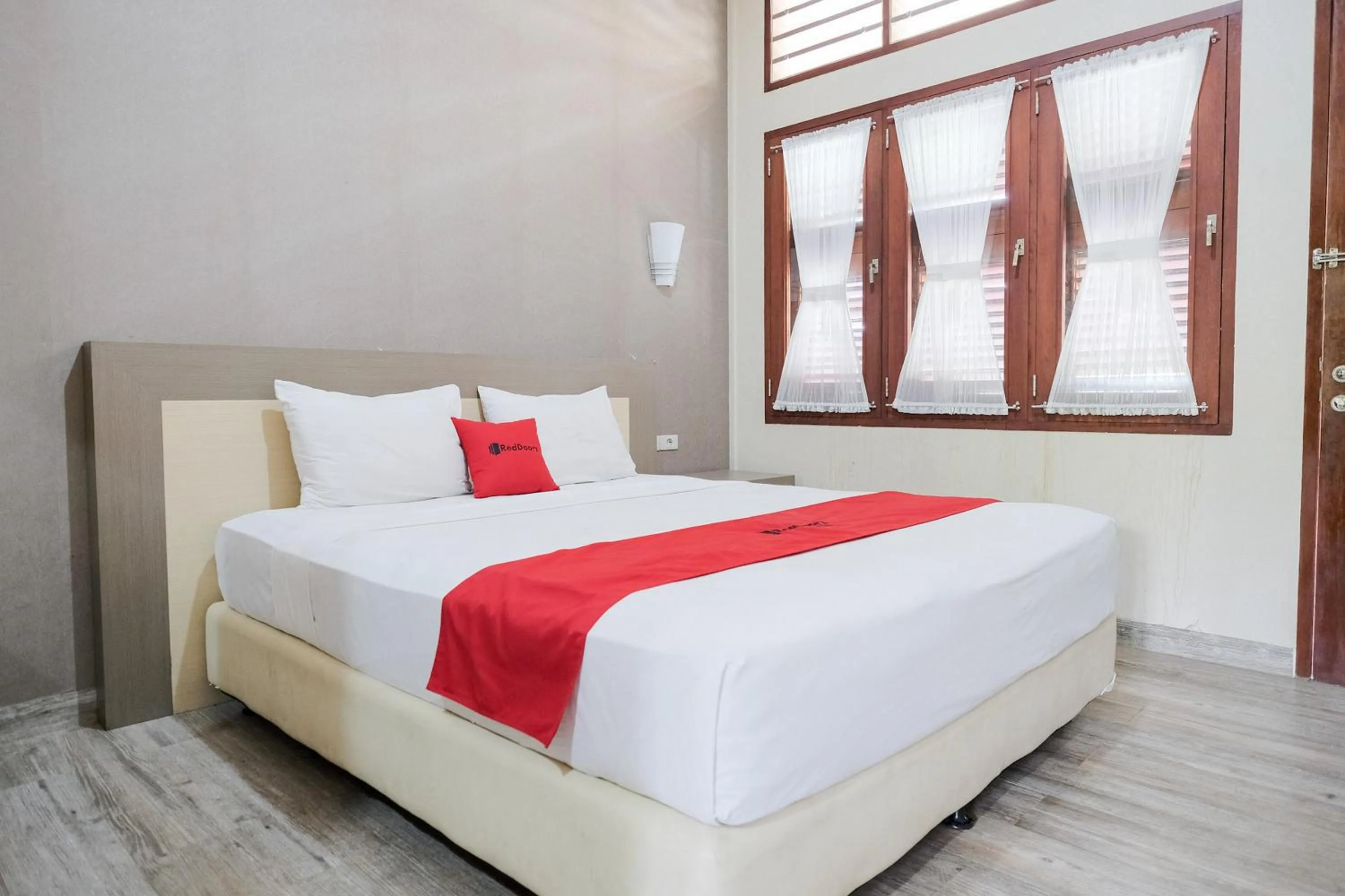 Bed in RedDoorz at Hotel Negeri Baru Kalianda Lampung