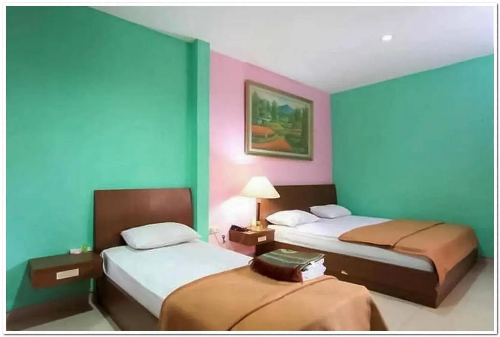 Family Room in The Nancy's Homestay Pekanbaru Mitra RedDoorz Family Room in The Nancy's Homestay Pekanbaru Mitra RedDoorz