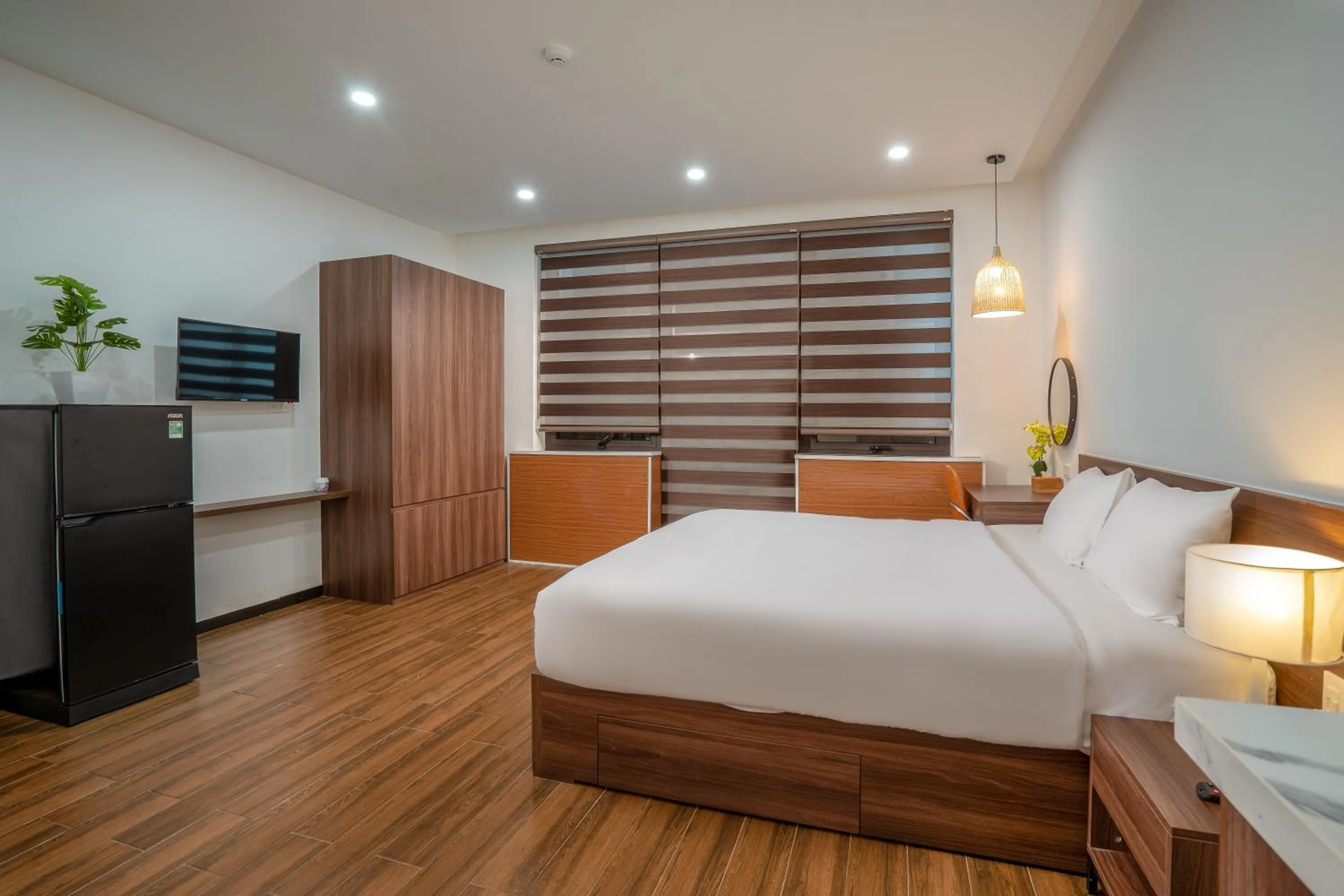 Bed in Dragon View Riverfront Hotel