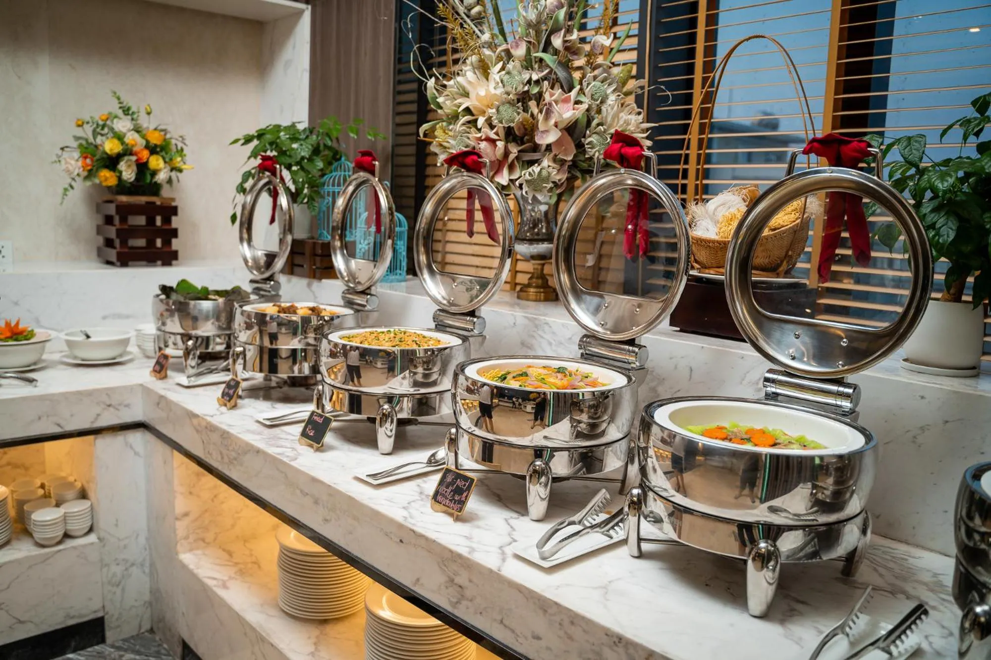 Buffet breakfast in DeLaSea Ha Long Hotel - Modern Bayview Escape