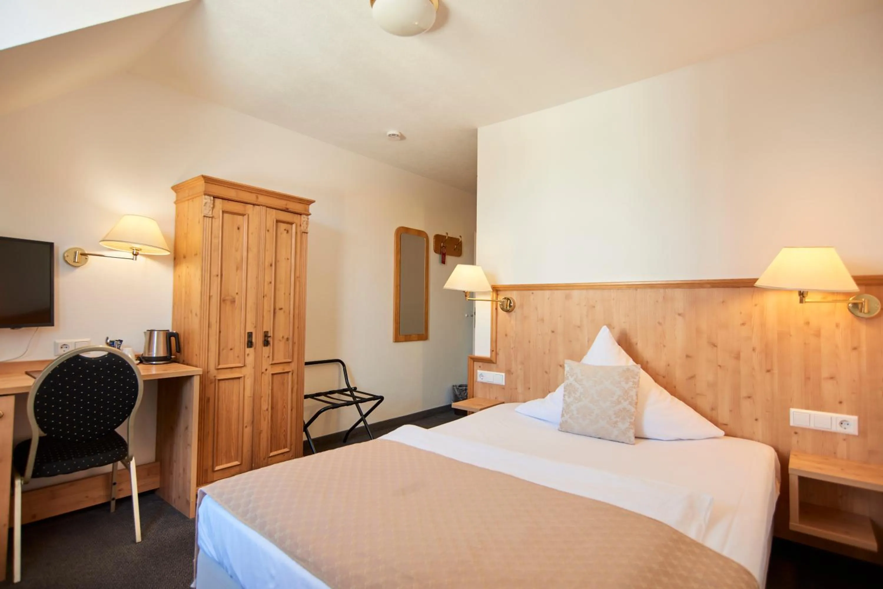 Bed in Hotel Restaurant Adler